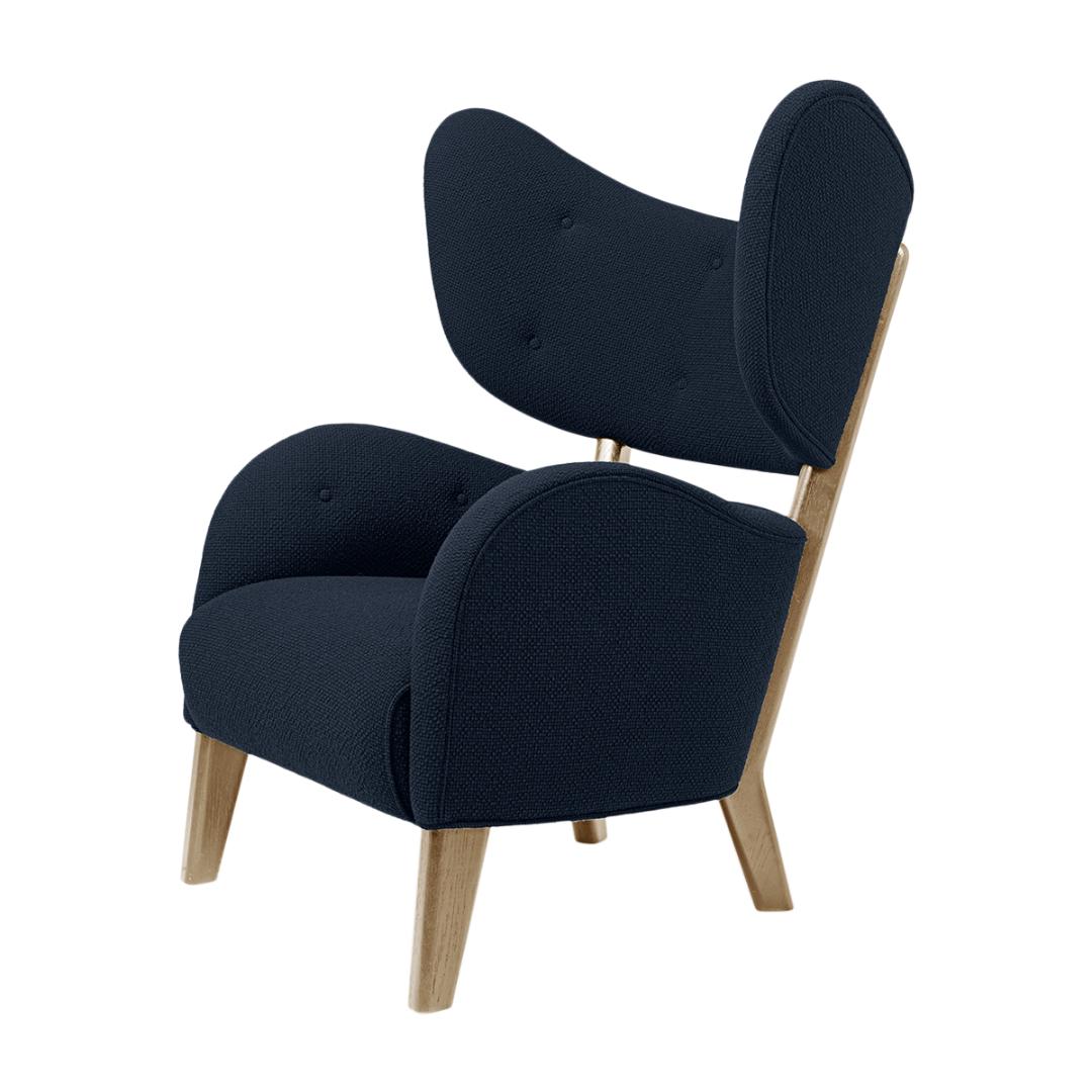 Blue sahco zero natural oak my own chair lounge chair by Lassen
Dimensions: W 88 x D 83 x H 102 cm 
Materials: Textile

Flemming Lassen's iconic armchair from 1938 was originally only made in a single edition. First, the then controversial,