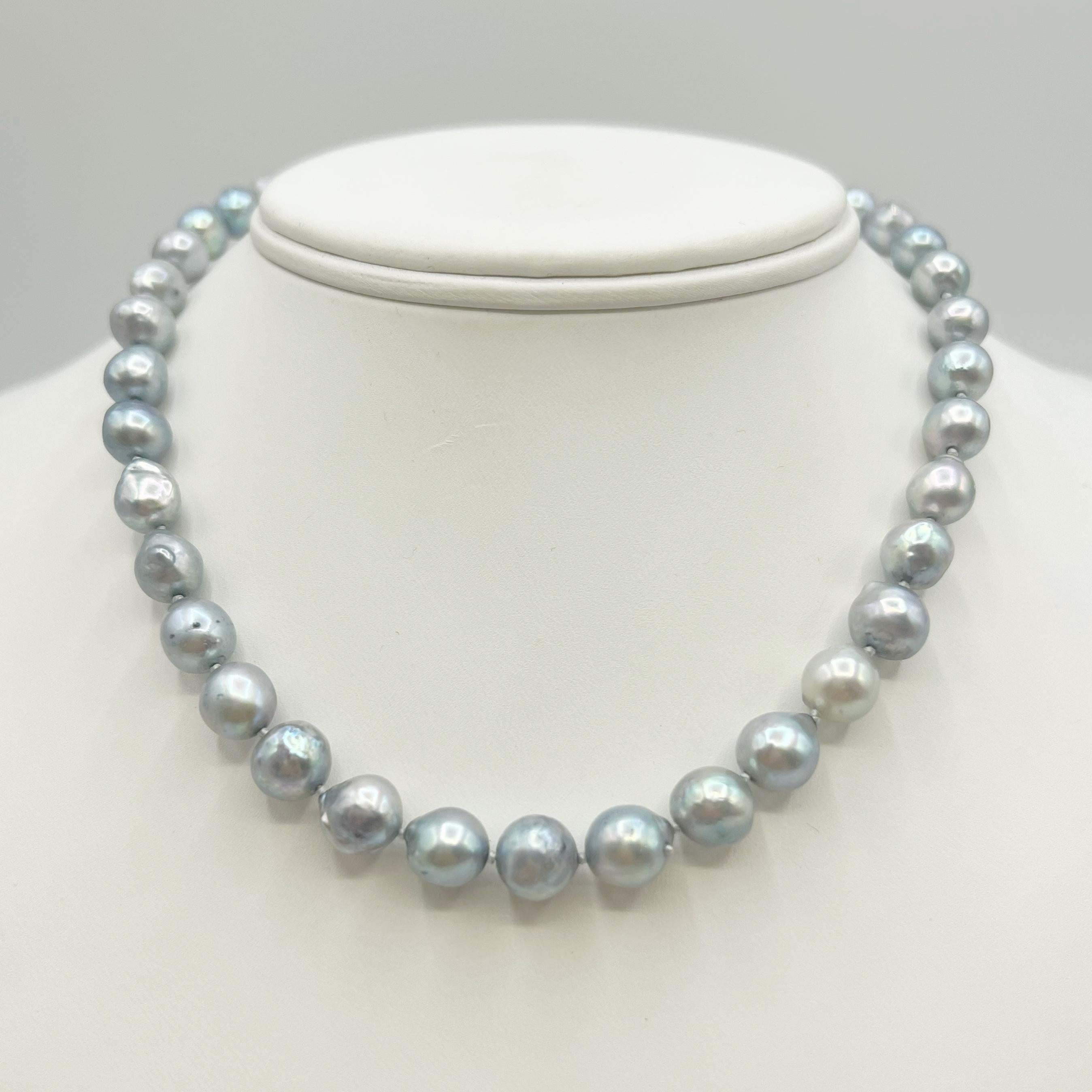Saltwater pearls have a beautiful luster that brings out the pale blue and silver hues. The choker length of 16