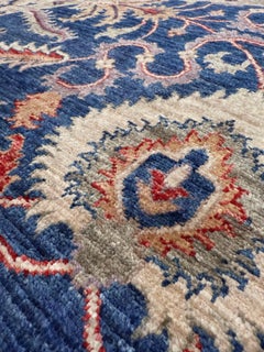 Alfombra redonda Oushak con motivos florales en azul y arena - Alfombra floral artesanal de estilo transicional (6x6)