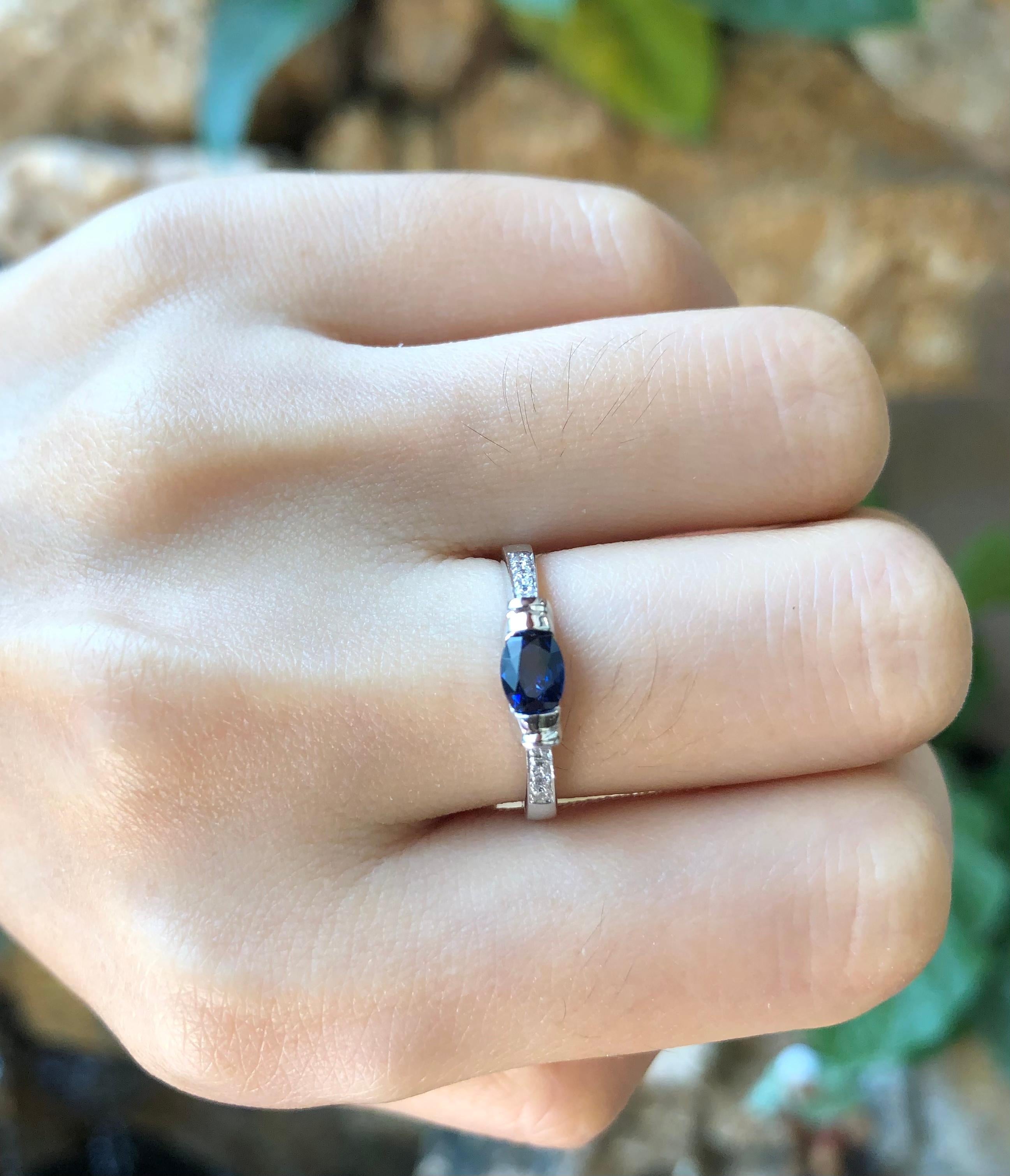 Oval Cut Blue Sapphire 0.52 Carat with Diamond 0.07 Carat Ring Set in 18 Karat White Gold For Sale