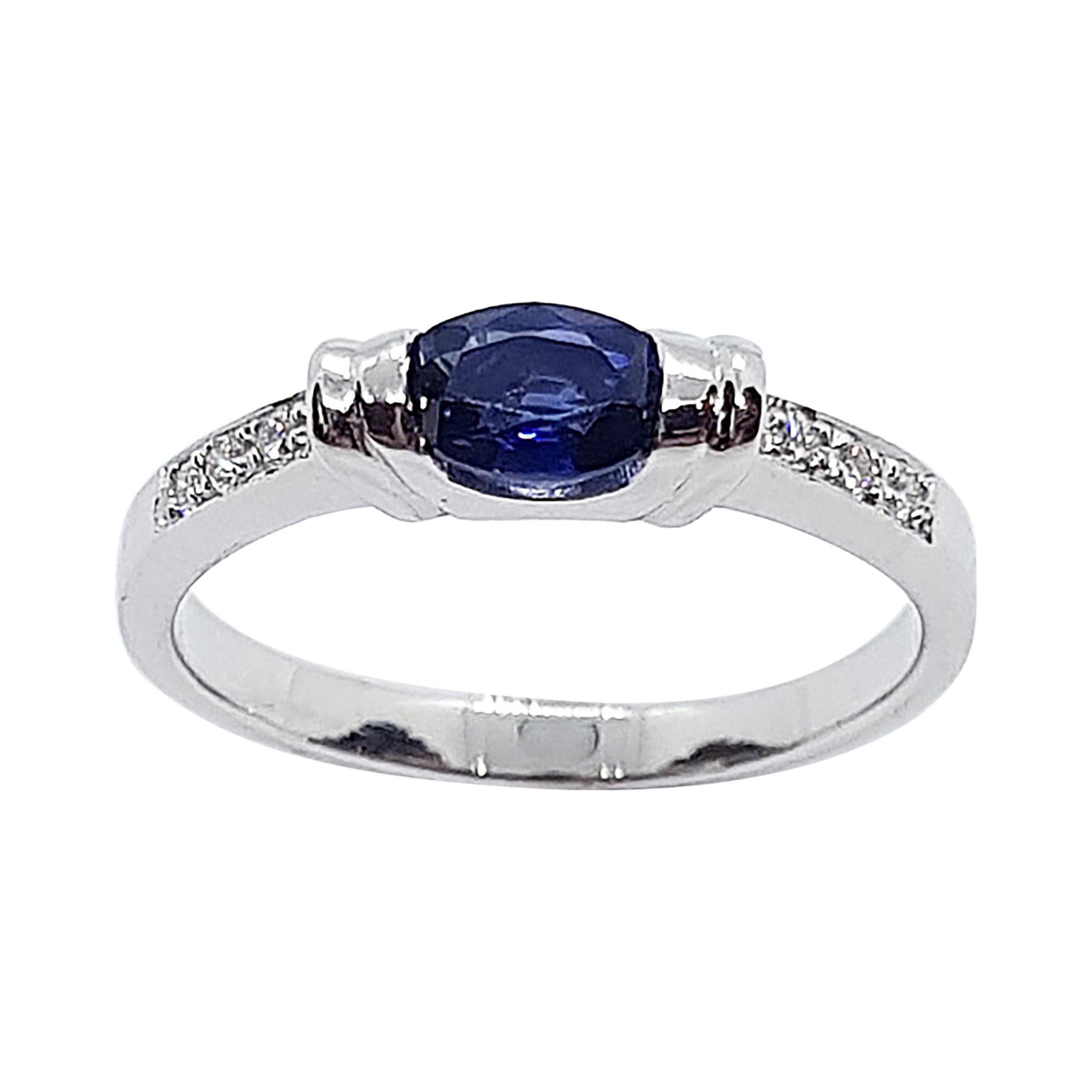 Blue Sapphire 0.52 Carat with Diamond 0.07 Carat Ring Set in 18 Karat White Gold For Sale