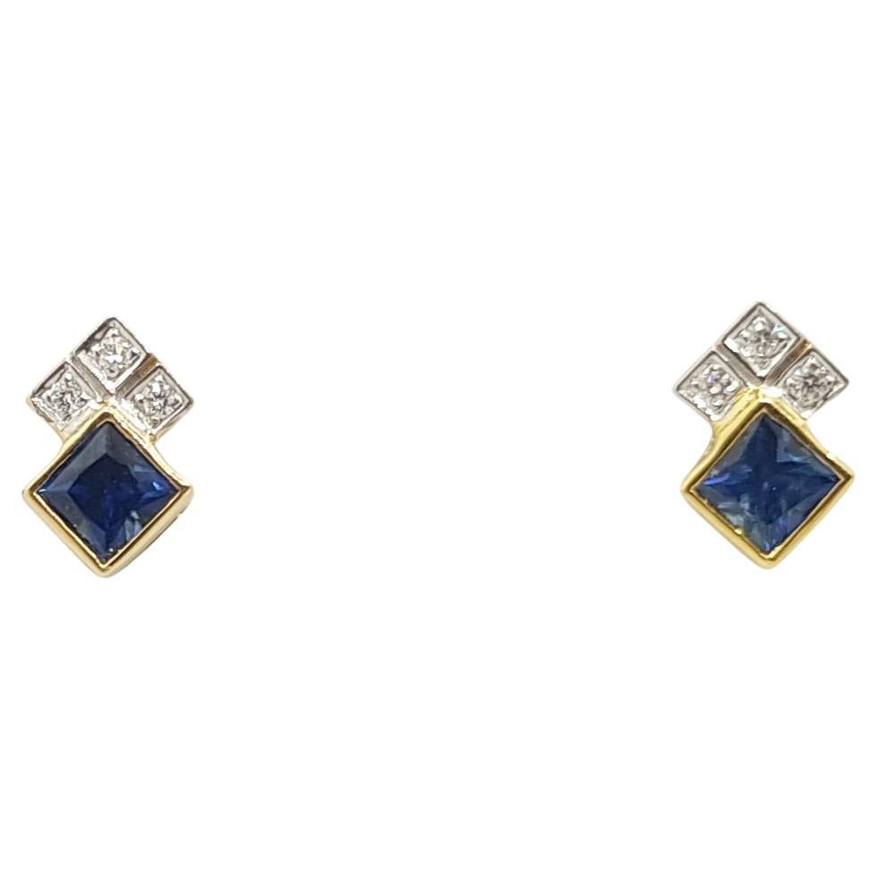 Blue Sapphire 0.58 Carat with Diamond 0.05 Carat Earrings Set in 18 Karat Gold S For Sale