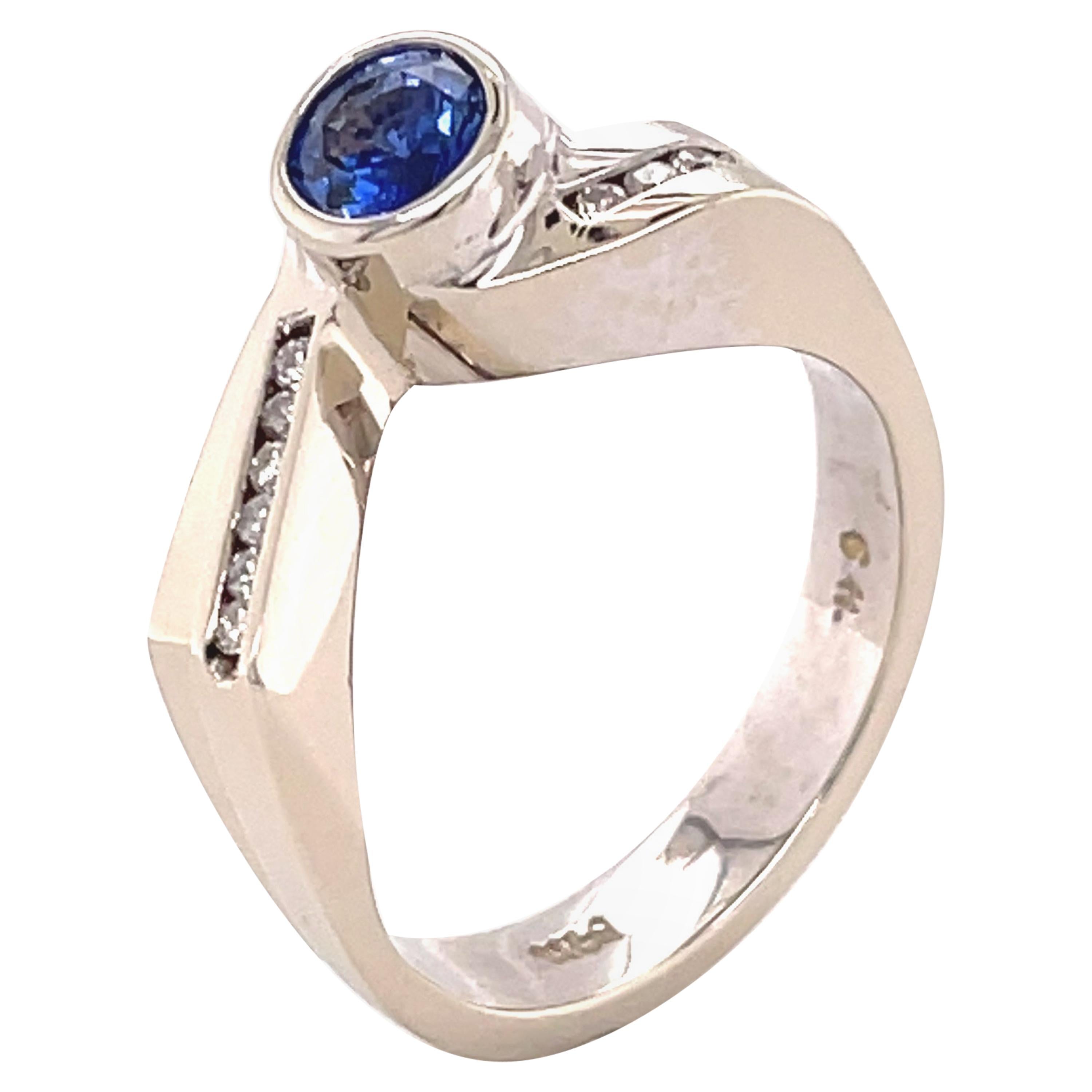 Blue Sapphire '0.59 Carat' Gold and Diamond Ring For Sale