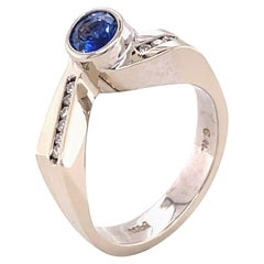 Blue Sapphire 
0.59 Carat
 Gold and Diamond Ring