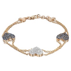 Bracelet à trois cœurs en or jaune 14 carats, saphir bleu 0,94 carat et diamant 0,42 carat