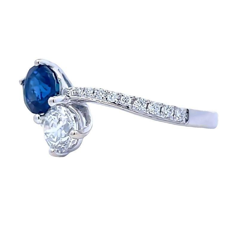 This gorgeous ring shows the balance between sapphire and diamond, the design is perfect to fit for a special or elegant occasion. Fall in love with blue sapphire with a total carat of 1.05C and one round white diamond with a total carat weight of