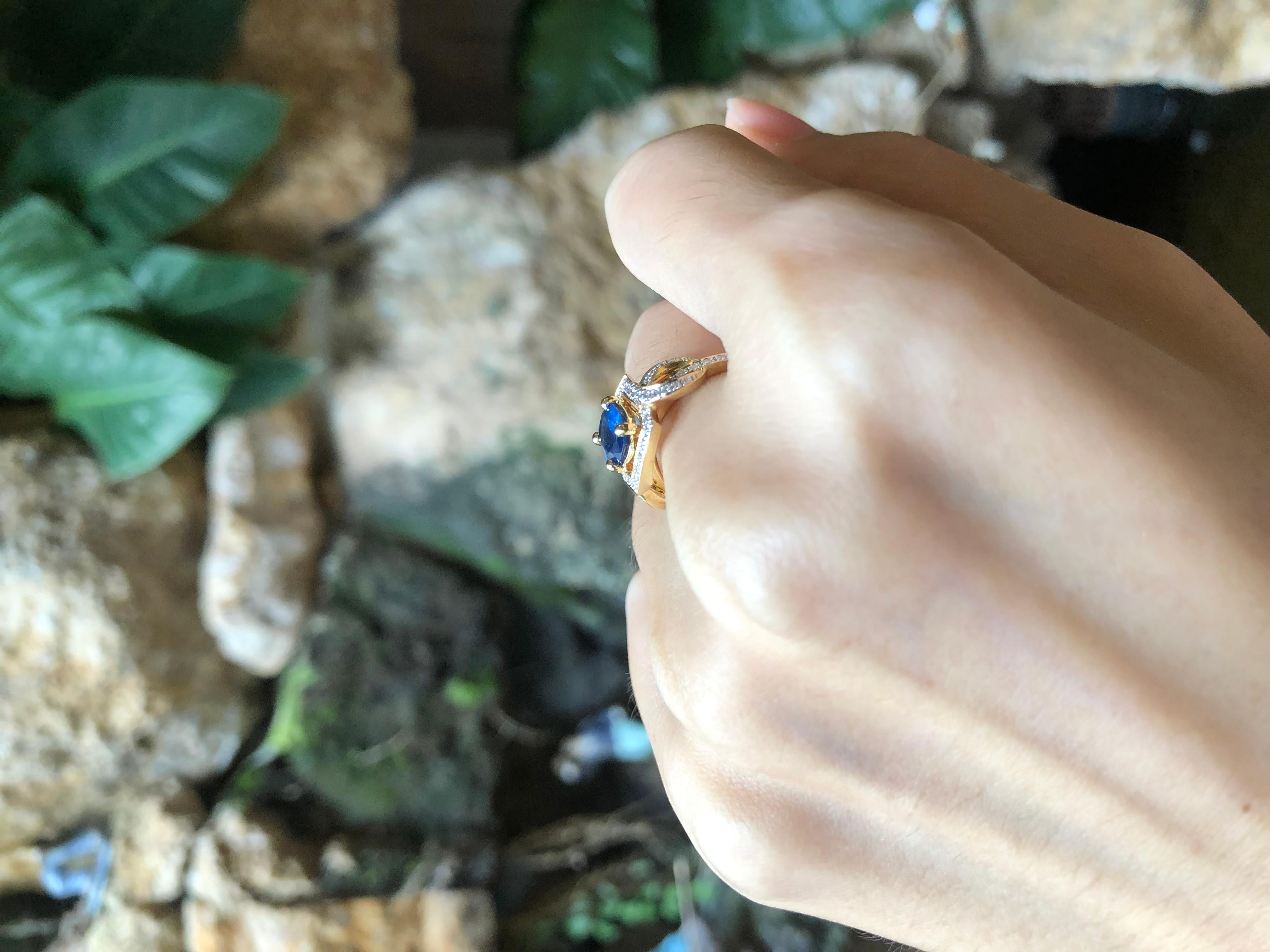 Oval Cut Blue Sapphire 1.18 Carats with Diamond 0.27 Carat Ring Set in 18 Karat Gold Sett For Sale