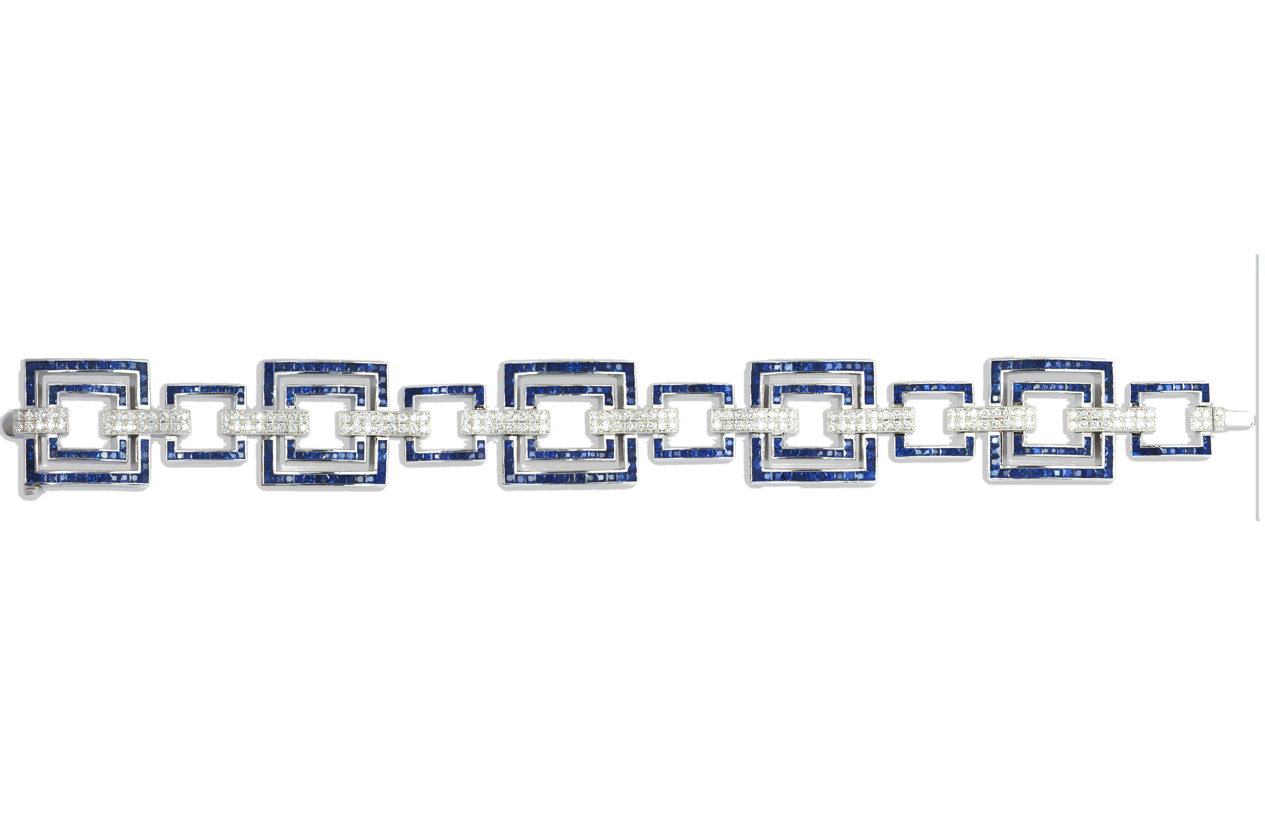 Blue Sapphire 13.43 cts with Diamond 2.13 cts Bracelet in 18k White Gold Settings

A statement modern Art Deco blue sapphire and diamond bracelet / bangle that you can easily dress up or down. The clean simple lines makes it a standout piece.