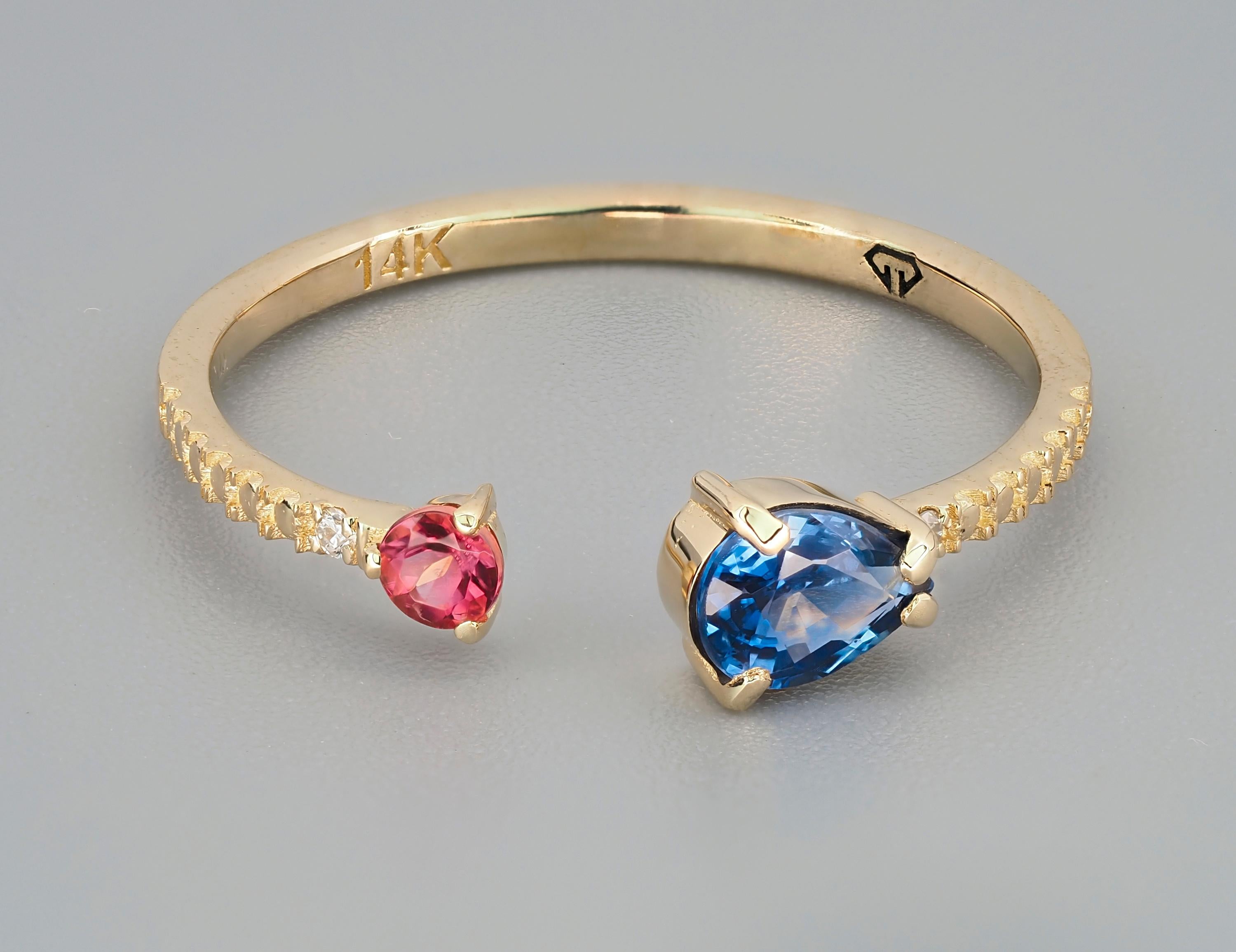 Blue sapphire 14k gold ring. 
Pear sapphire gold ring. Genuine sapphire ring. Opend enged ring with gemstones. Natural sapphire ring.

Weight: 1.3 g. depends from size.
Gold - 14k gold.

Central stone: Sapphire
Cut: pear
Weight: aprx 0.6 ct.
Color: