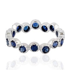 Blue Sapphire 18 Karat Gold Eternity Ring