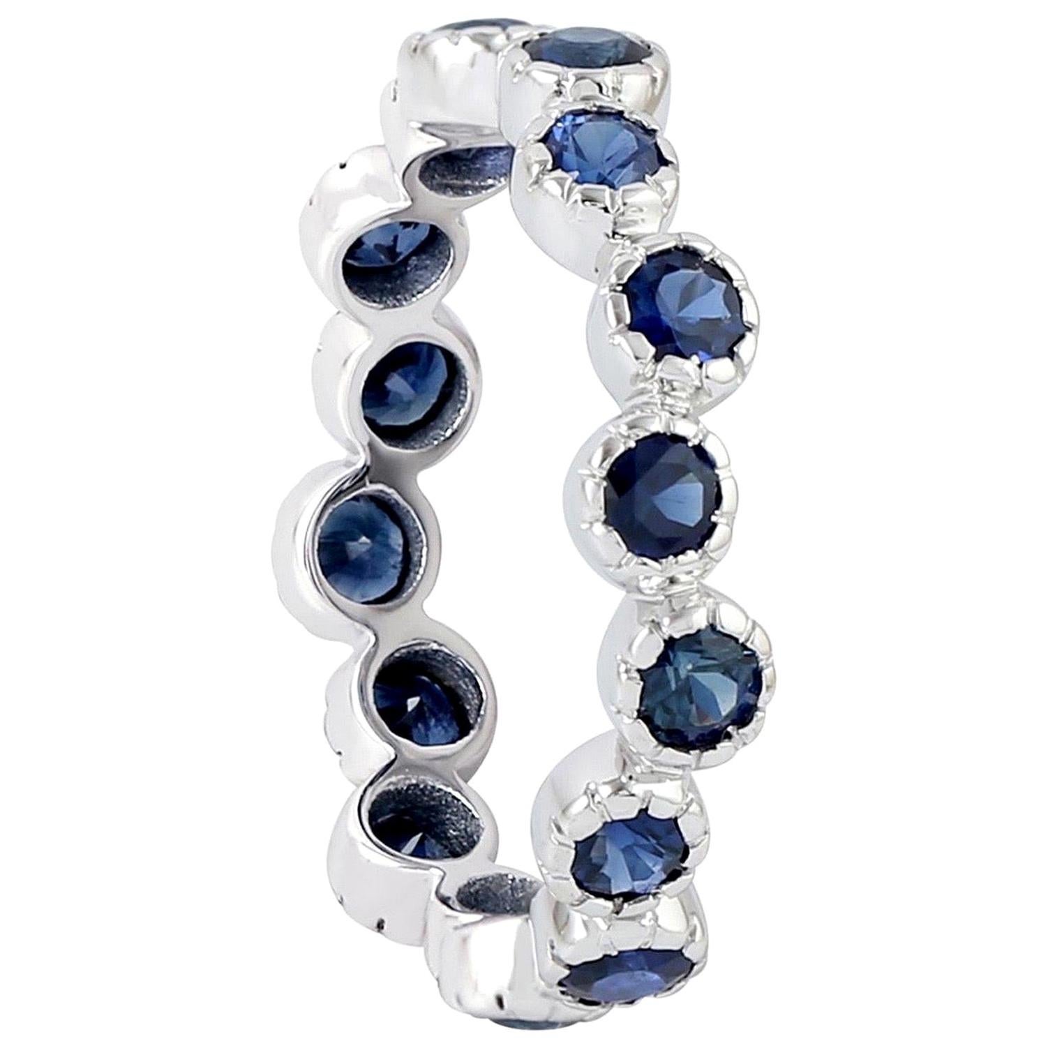 For Sale:  Blue Sapphire 18 Karat Gold Eternity Ring