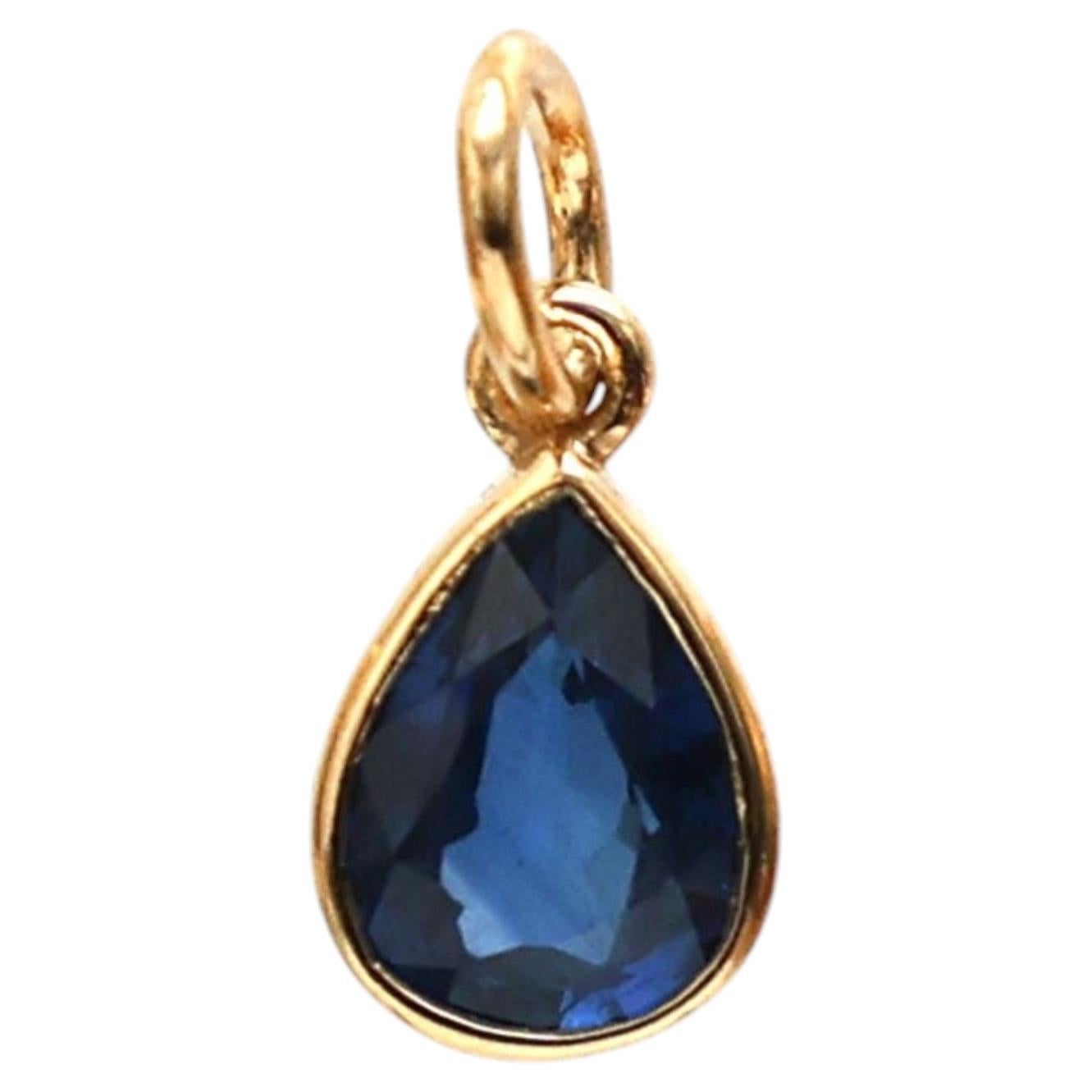 Collana con ciondolo in oro giallo 18 carati con zaffiro blu da 0,95 carati