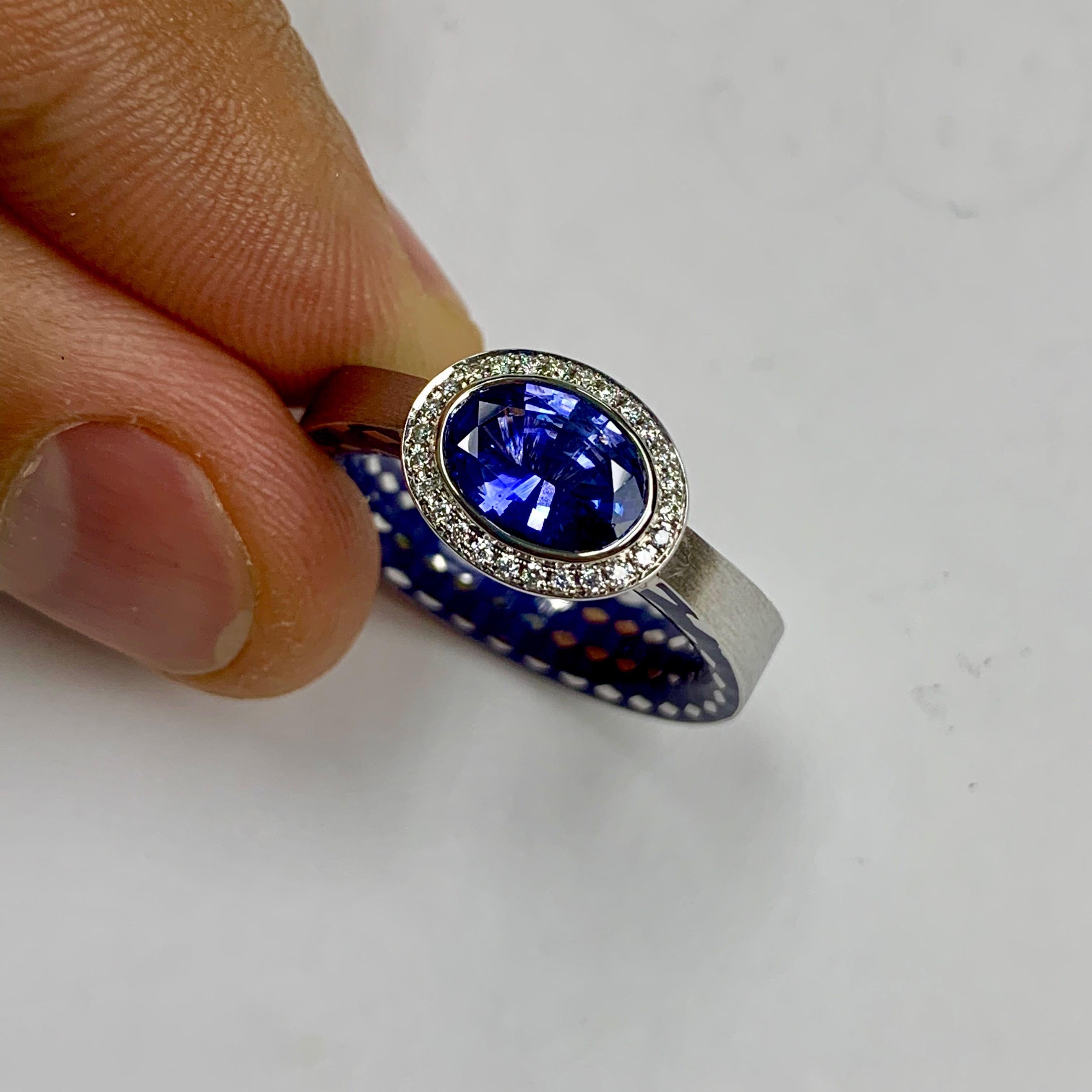 Blue Sapphire 1.91ct Diamonds Enamel 18 Karat White Gold Kaleidoscope Ring

Please take a look at one of our trade mark texture in Kaleidoscope Collection - 