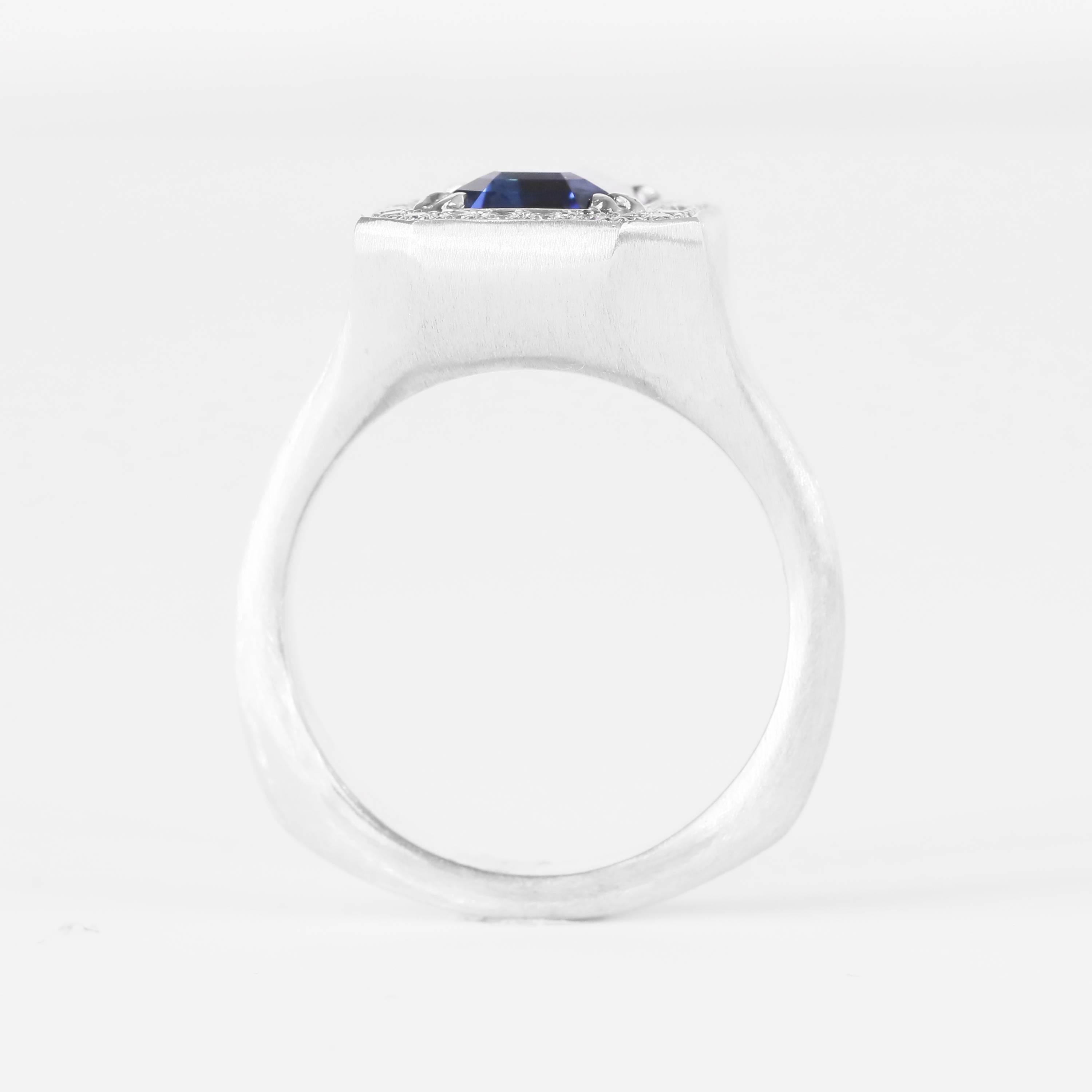 Women's Blue Sapphire 3.43 Carat Emerald Cut 18 Karat White Gold Brushed Ring For Sale