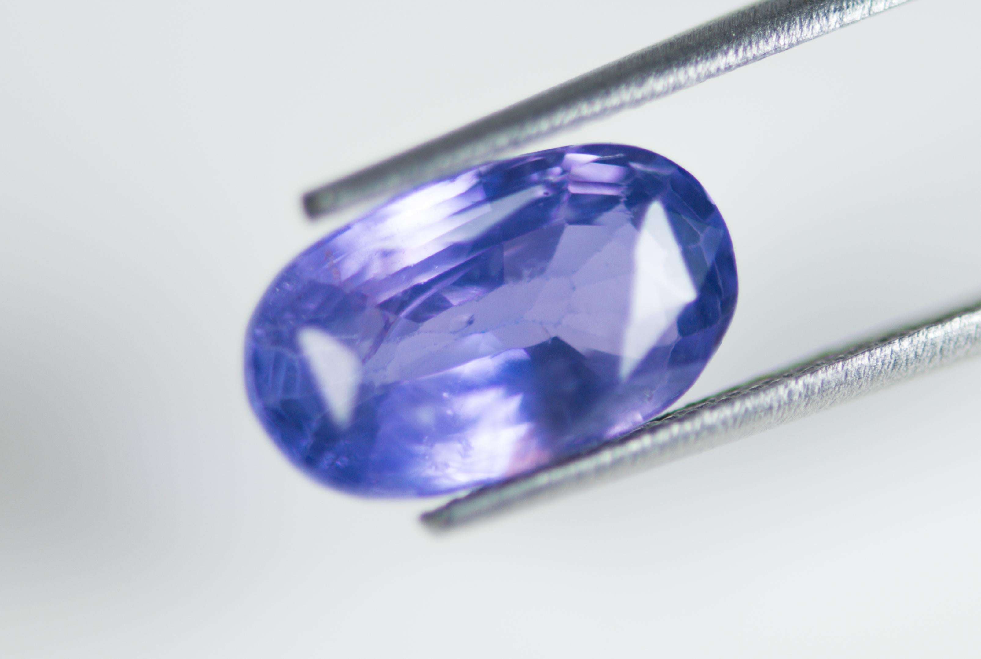 Oval Cut Natural 4.09 Carat Blue Sapphire IGI Certified For Sale