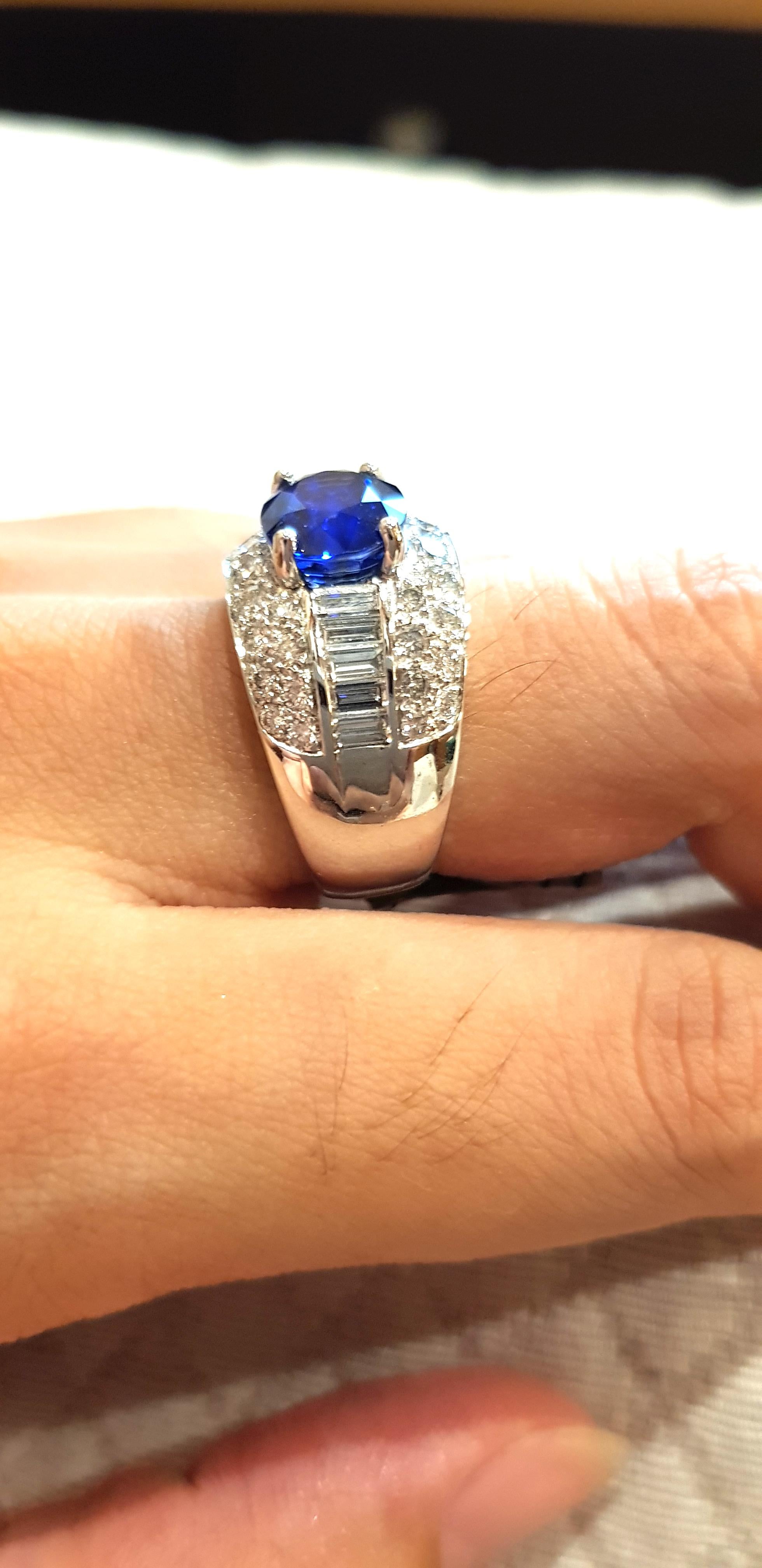 Oval Cut Blue Sapphire 4.34 Carat Diamond 1.94 Carat Ring in 18 Karat White Gold Settings For Sale