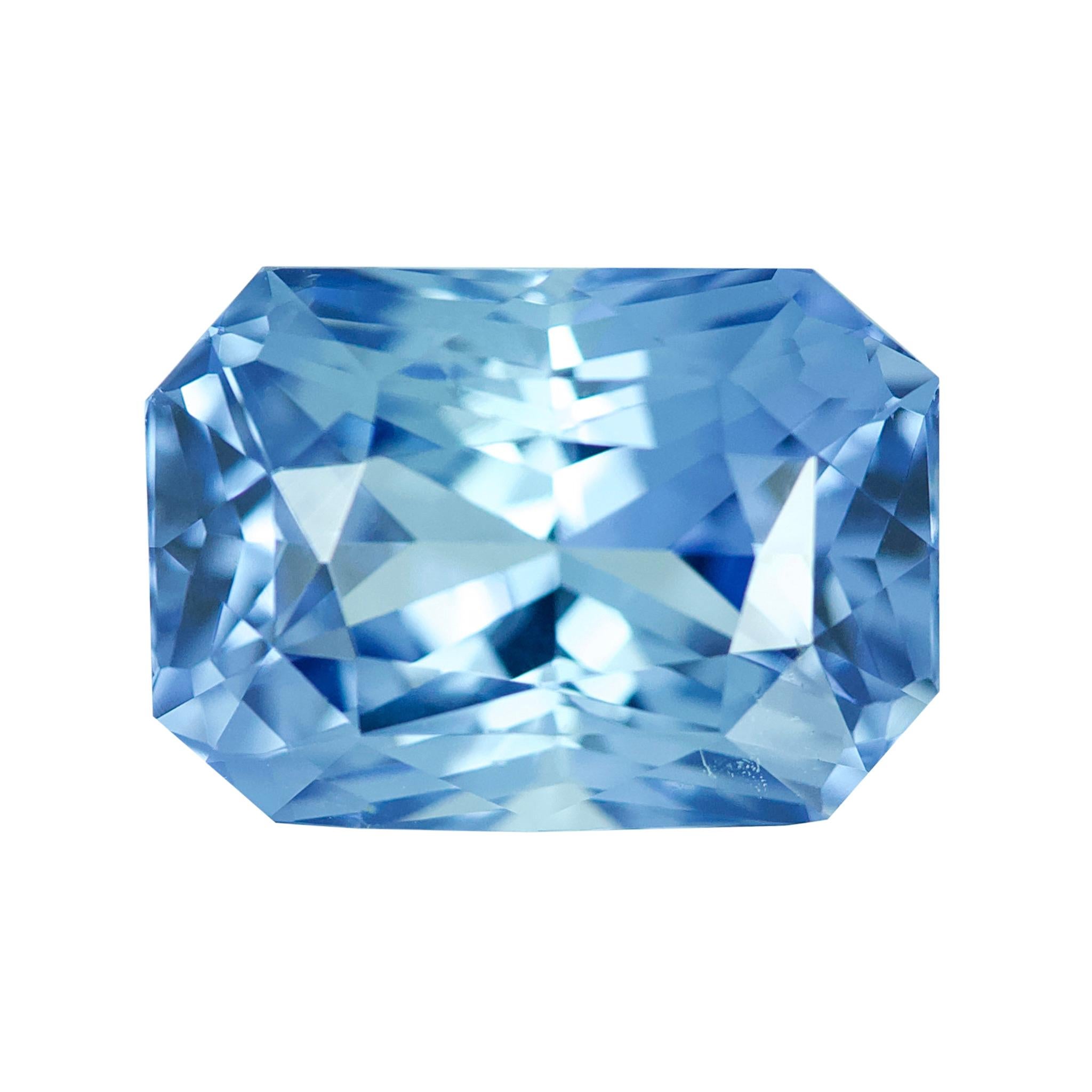 Rectangular radiant cut over 5 carat, this exceptional natural blue sapphire is dripping with personality and sparkle. Admired for its Ceylon origin and colour this natural unheated blue sapphire will make the ideal centrepiece for a bespoke