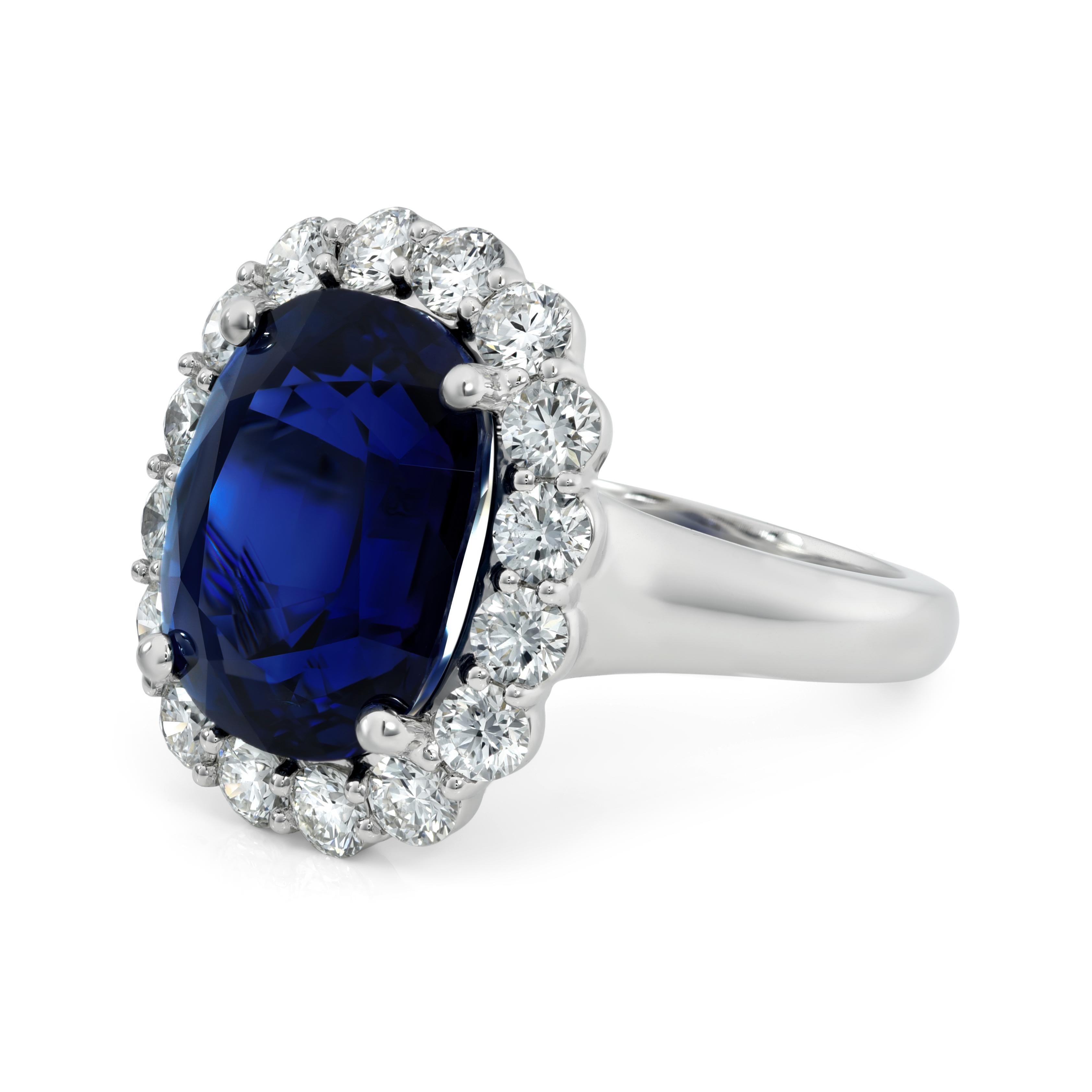 Dive into the enchanting allure of our Natural Blue Sapphire Ring, a radiant masterpiece for your special occasion. With breathtaking 10.64 carats oval gem from Madagascar, elegantly set in Platinum and adorned with 1.51 carats of Diamonds, this