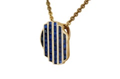 Blue Sapphire ad Diamond Agamo Pendant set in 18K Gold Settings
