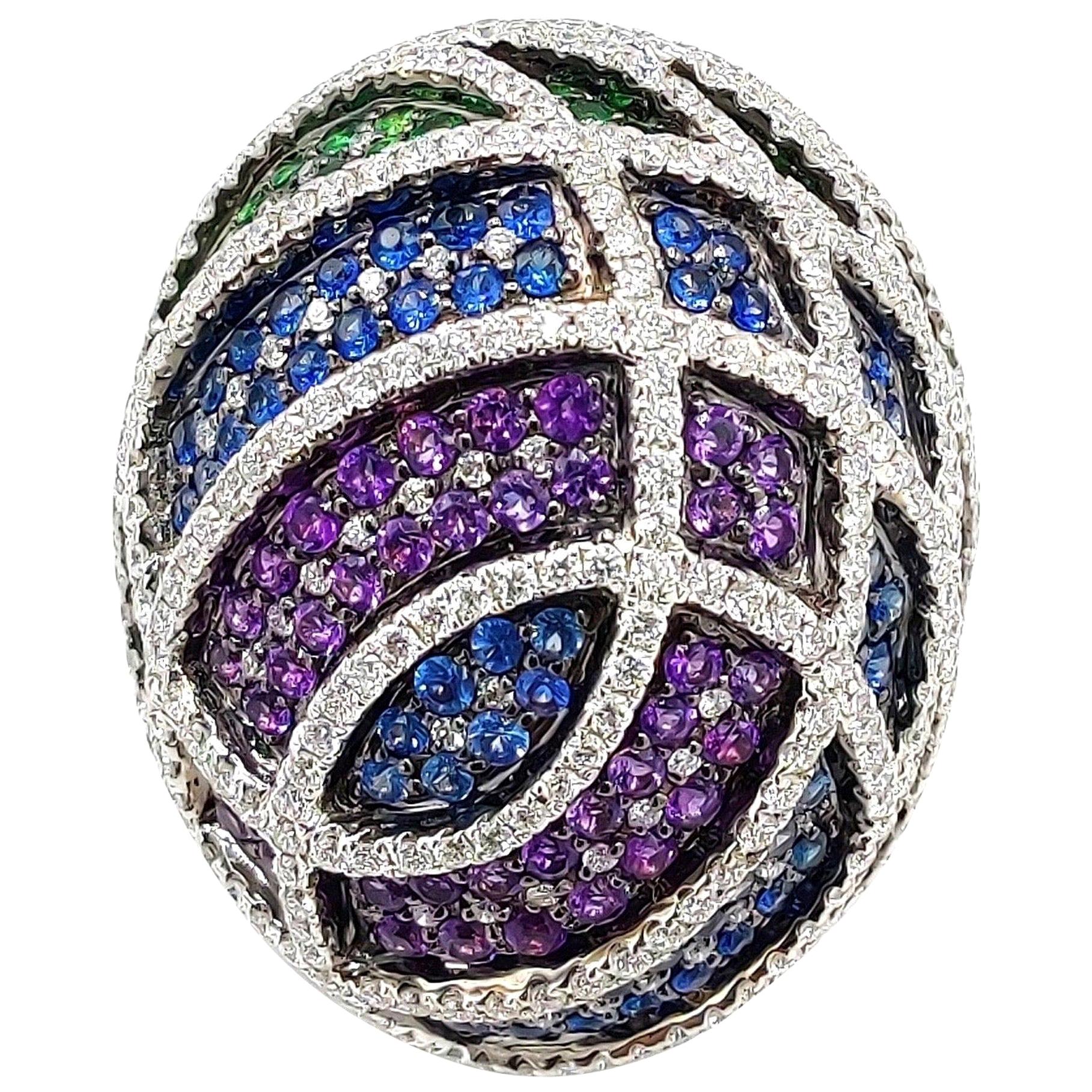 Bague bombée en or 18 carats avec saphir bleu, améthyste, tsavorite et diamant