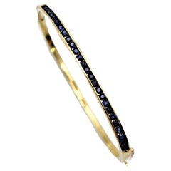 Blue Sapphire and 18 Karat Yellow Gold Rectangle Hinged Narrow Bangle Bracelet