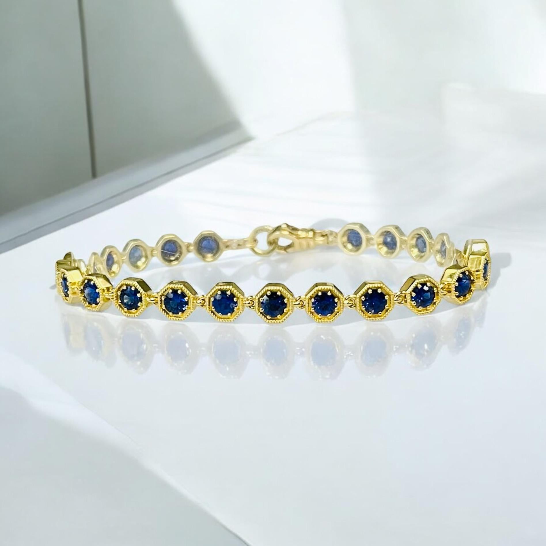 This exquisite sapphire tennis bracelet features a stunning collection of 