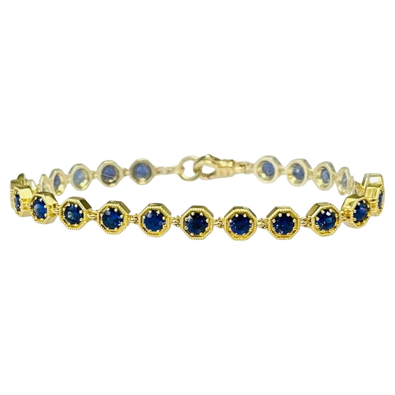 Tennisarmband aus 18 Karat Gelbgold mit blauem Saphir und 4,96 Karat insgesamt, 7 Zoll