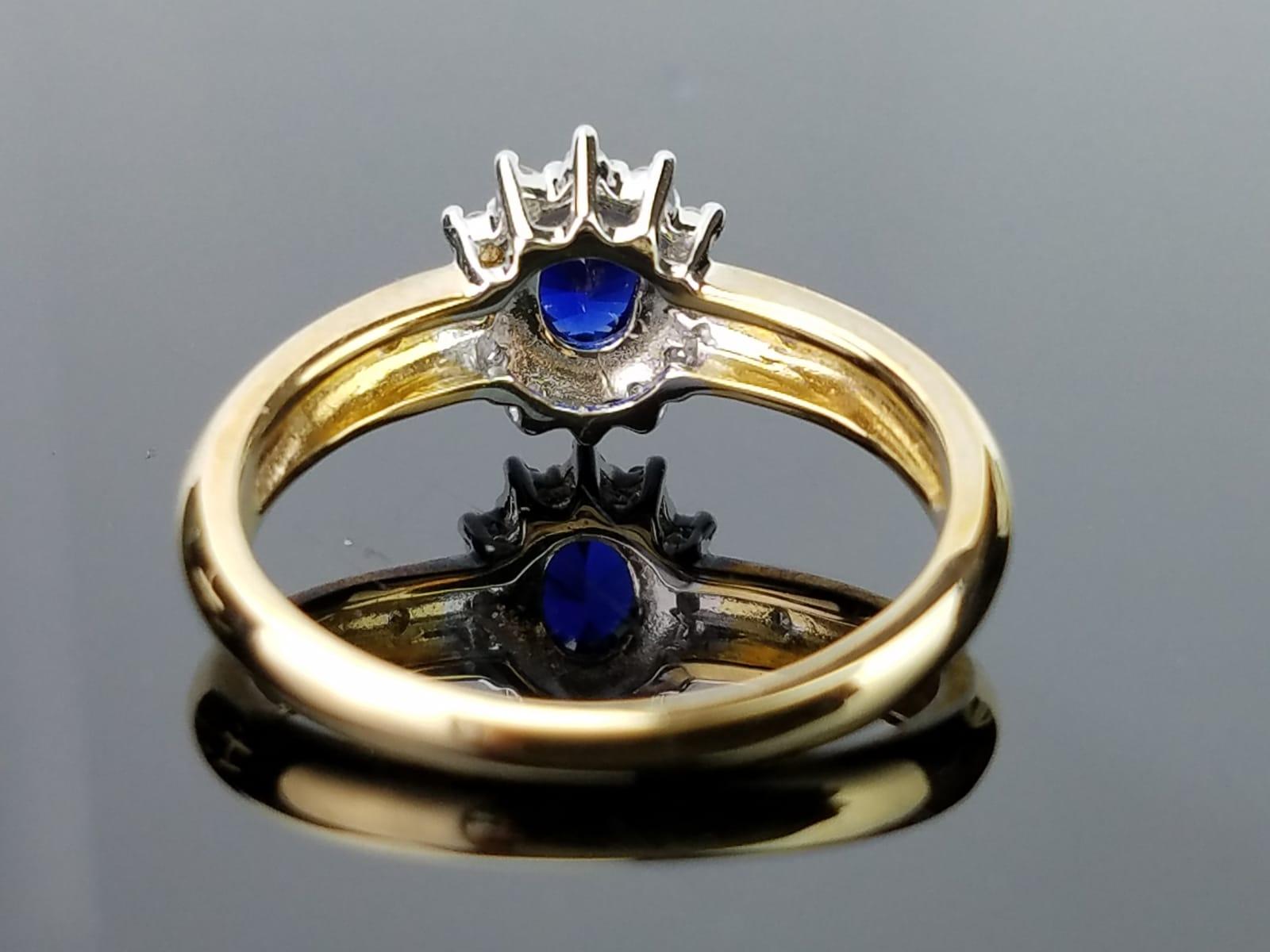 Oval Cut Blue Sapphire and Diamond 14 Karat Gold Ring