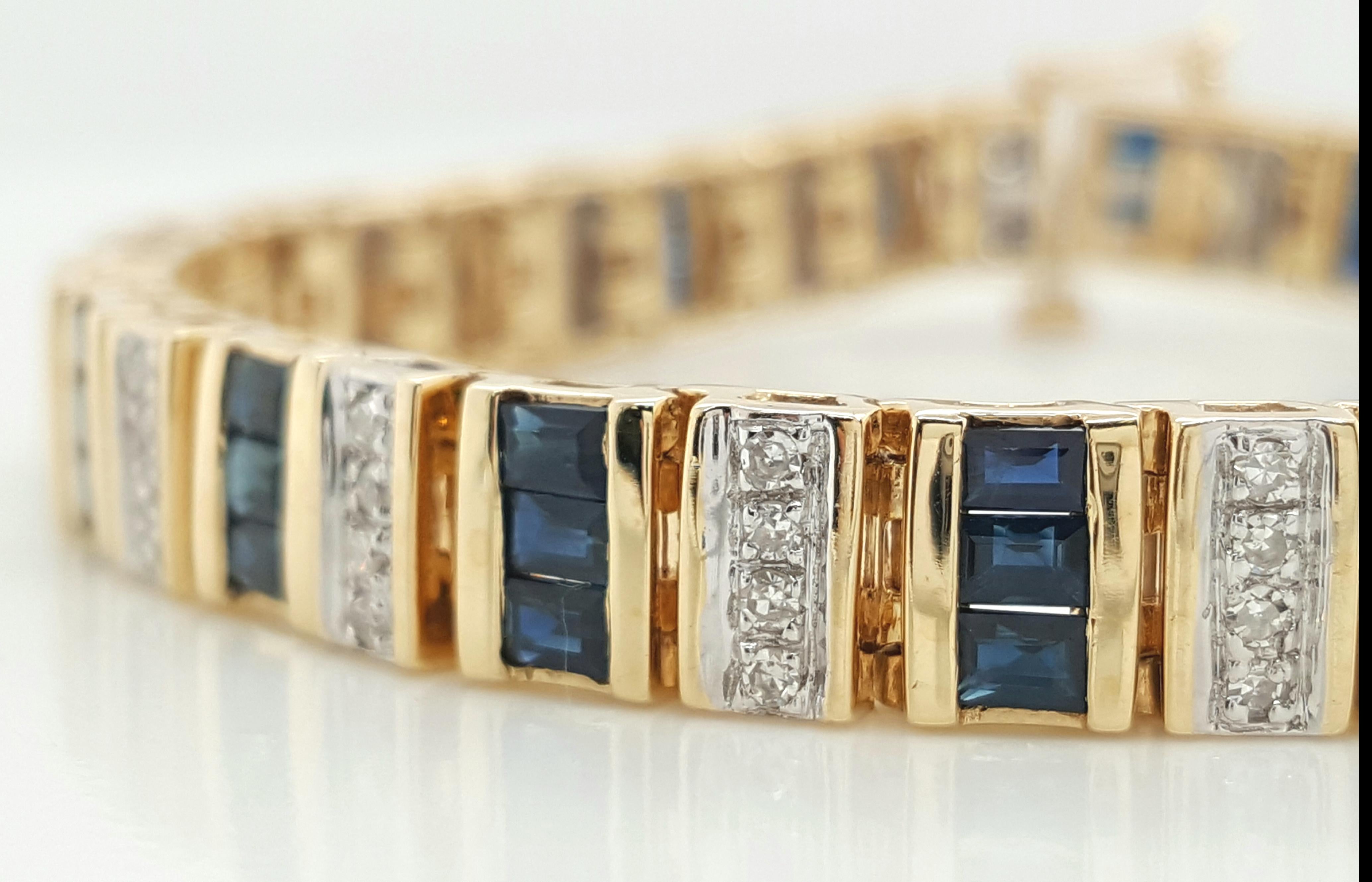 This incredible tennis bracelet is an absolute beauty. It is flowing with 1.5 carats of baguette natural bright blue sapphires alternating with 0.75 ct round brilliant diamonds in-between. The bracelet is made of 14 karat yellow gold and sits on the