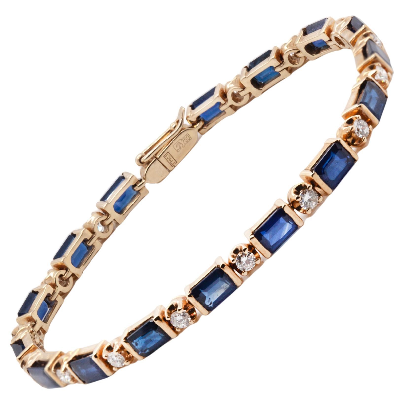 Bracciale tennis in oro giallo 18 carati con zaffiro blu e diamanti