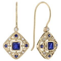 Blue Sapphire and Diamond Art Deco Style Drop Earrings in 14K Yellow Gold Blue Sapphire and Diamond Art Deco Style Drop Earrings in 14K Yellow Gold