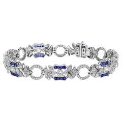 Bracciale a maglie floreali in oro bianco 18 carati con zaffiro blu e diamanti in stile Art Deco