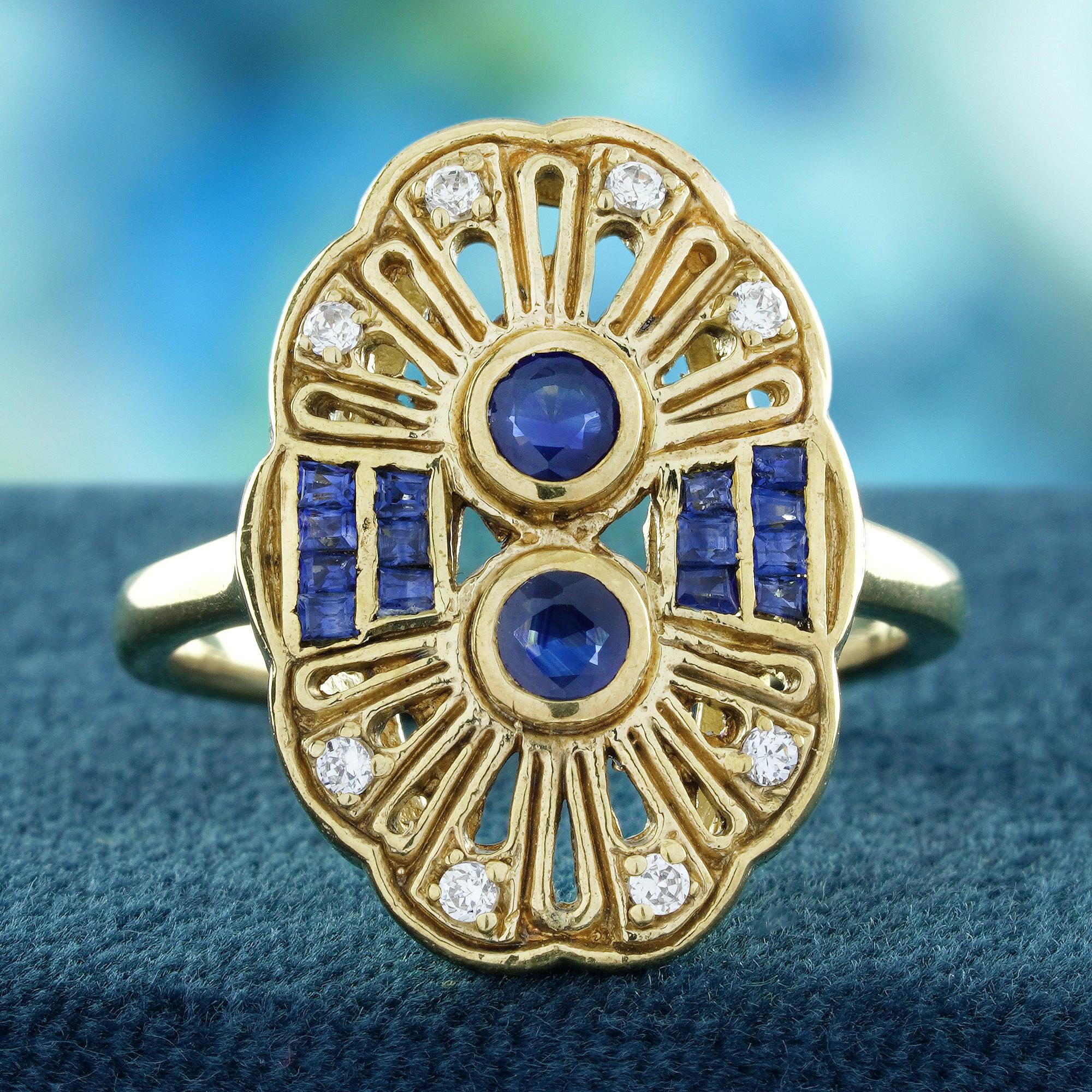 showcases two striking deep blue sapphires at its center, radiating a rich, vibrant hue that captures the light with every movement. Brilliant diamonds accentuate the design, adding an extra layer of sparkle and elegance.The overall design evokes a