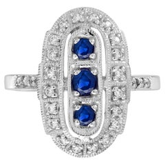 Blue Sapphire and Diamond Art Deco Style Three Stone Ring in 14K White Gold