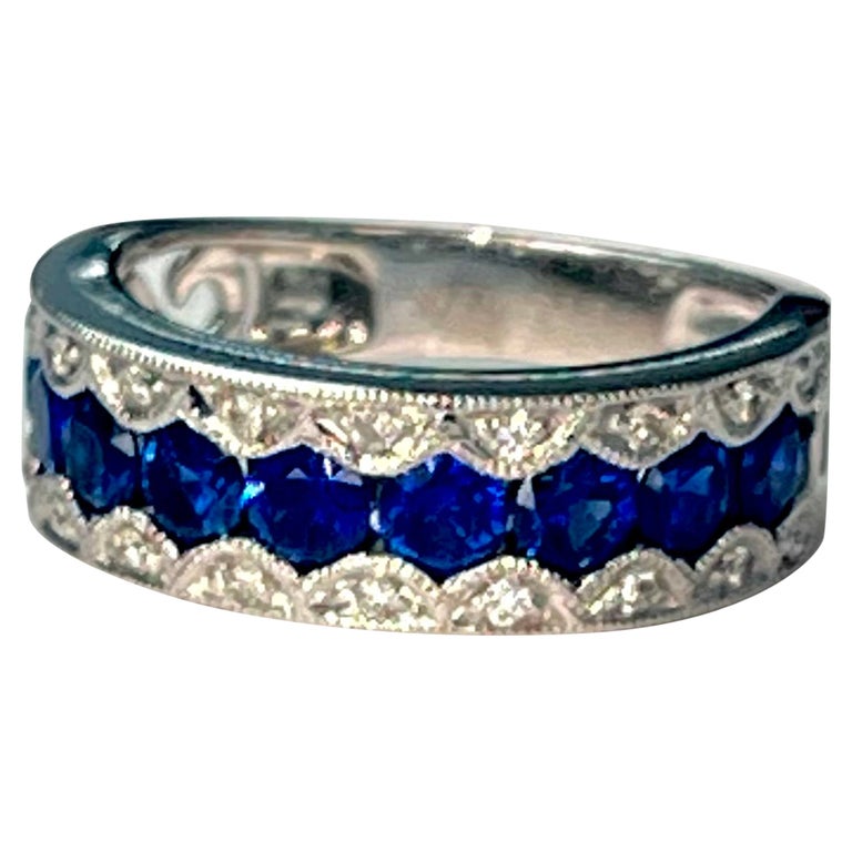 Bague jonc en or blanc 18 carats avec saphir bleu et diamants