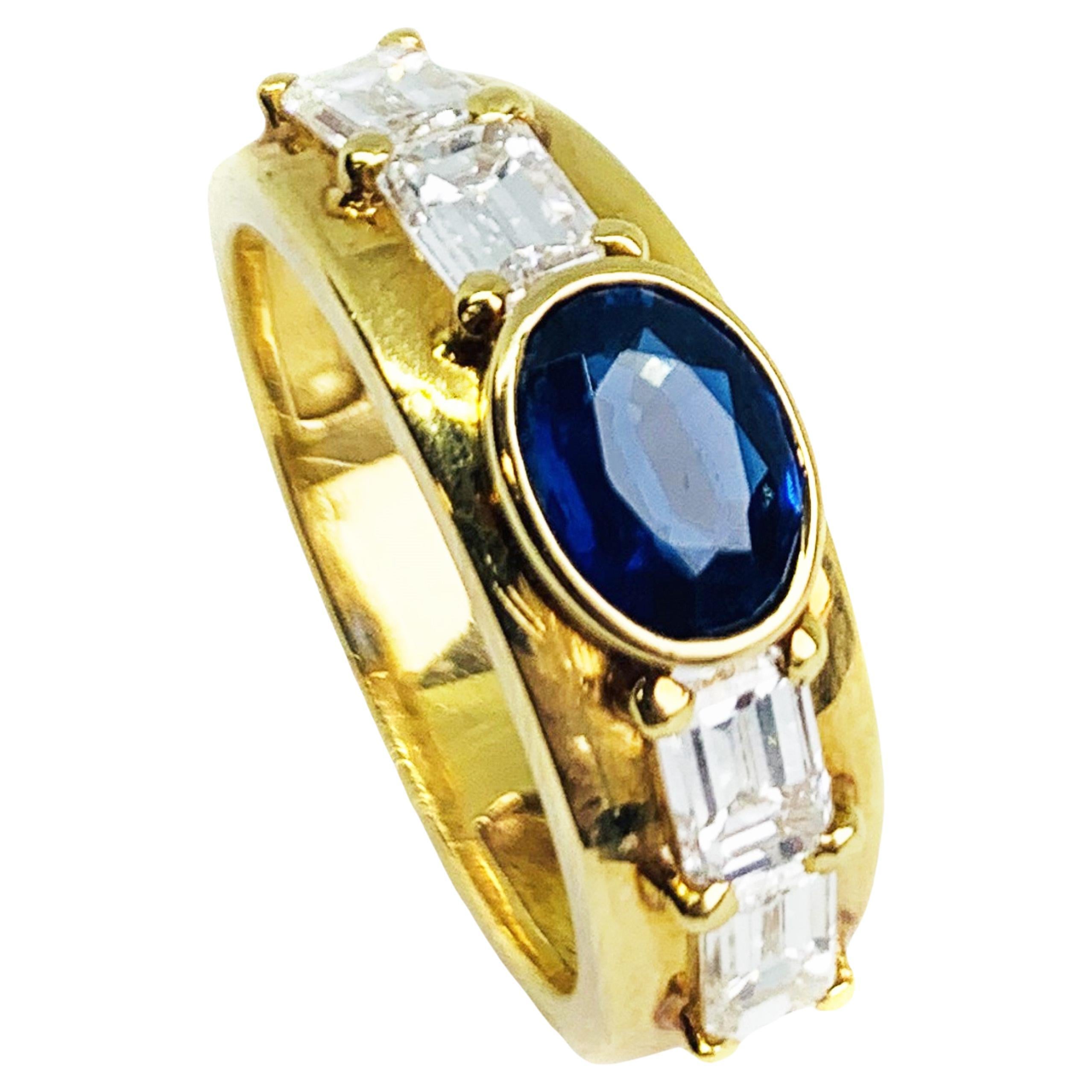 Bague en or jaune avec saphir bleu et diamant  en vente