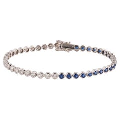 Blue Sapphire and Diamond Bezel Set Tennis Bracelet