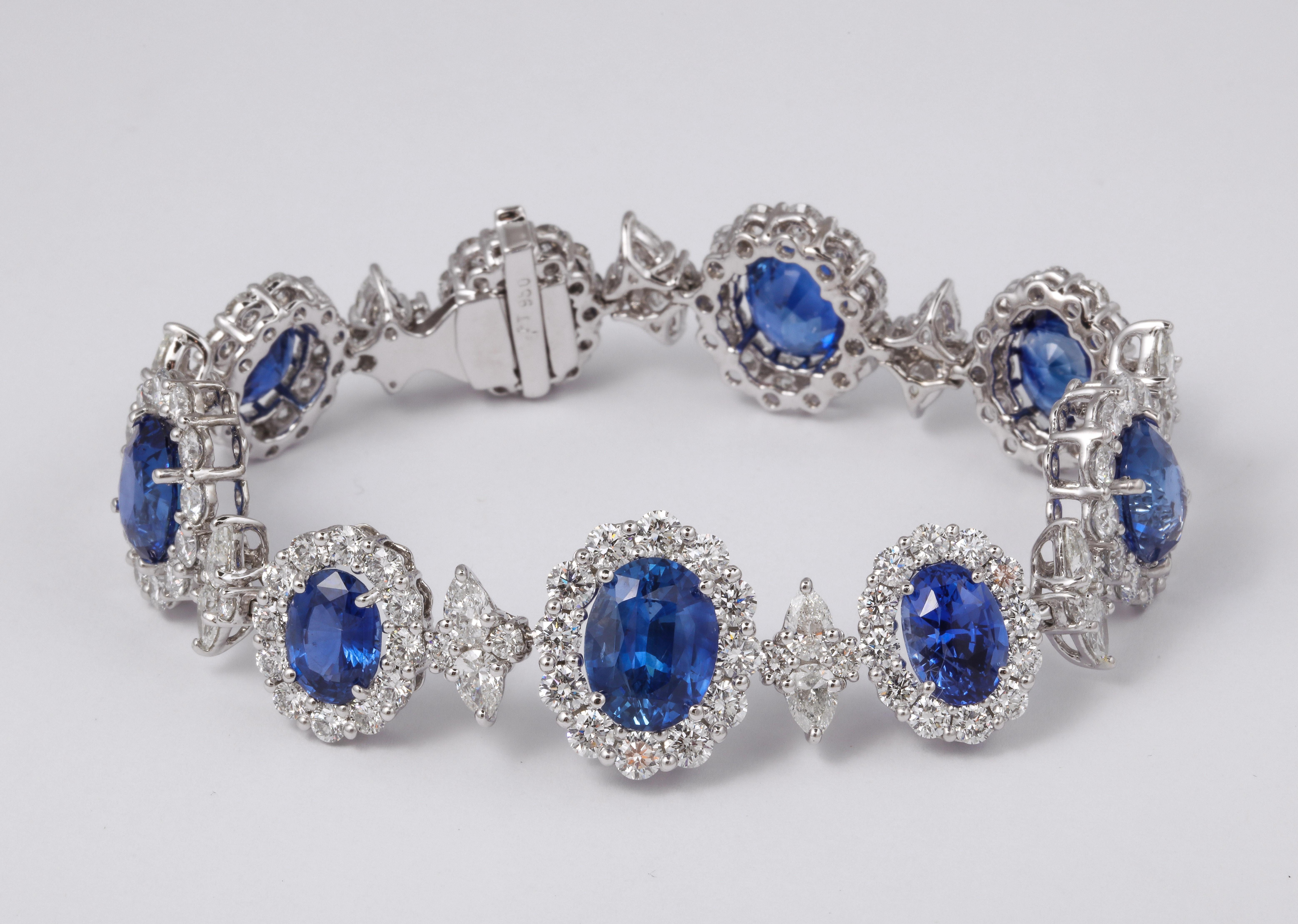 
Classic sapphire and diamond bracelet.

32.86 carats of Fine Blue Ceylon Sapphire 

16.84 carats of white round brilliant and pear shape diamonds. 

Just over 7 inches in length, .70 inches wide. 

Certified by Christian Dunaigre of Switzerland