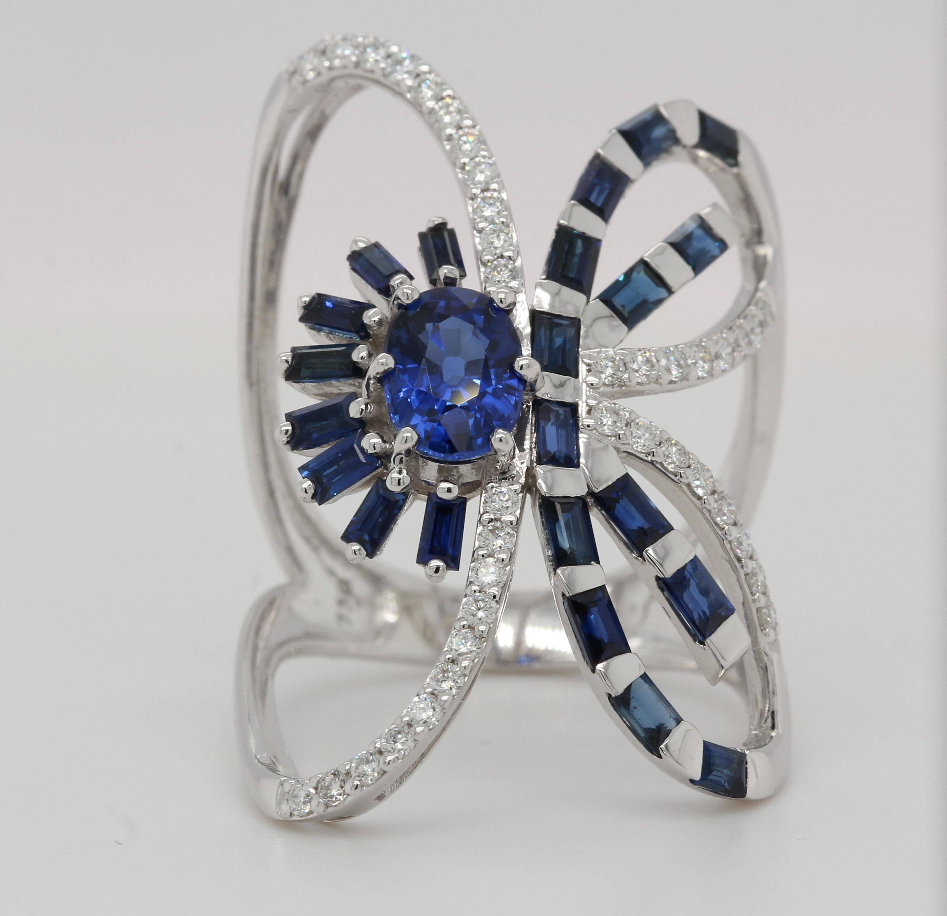A gorgeous sapphire and diamond butterfly ring in 18K gold. This stunning 18K white gold sapphire and diamond butterfly ring will give your look a glamorous update. The blue sapphire is so eye-catching, it will make any outfit pop! You can also add