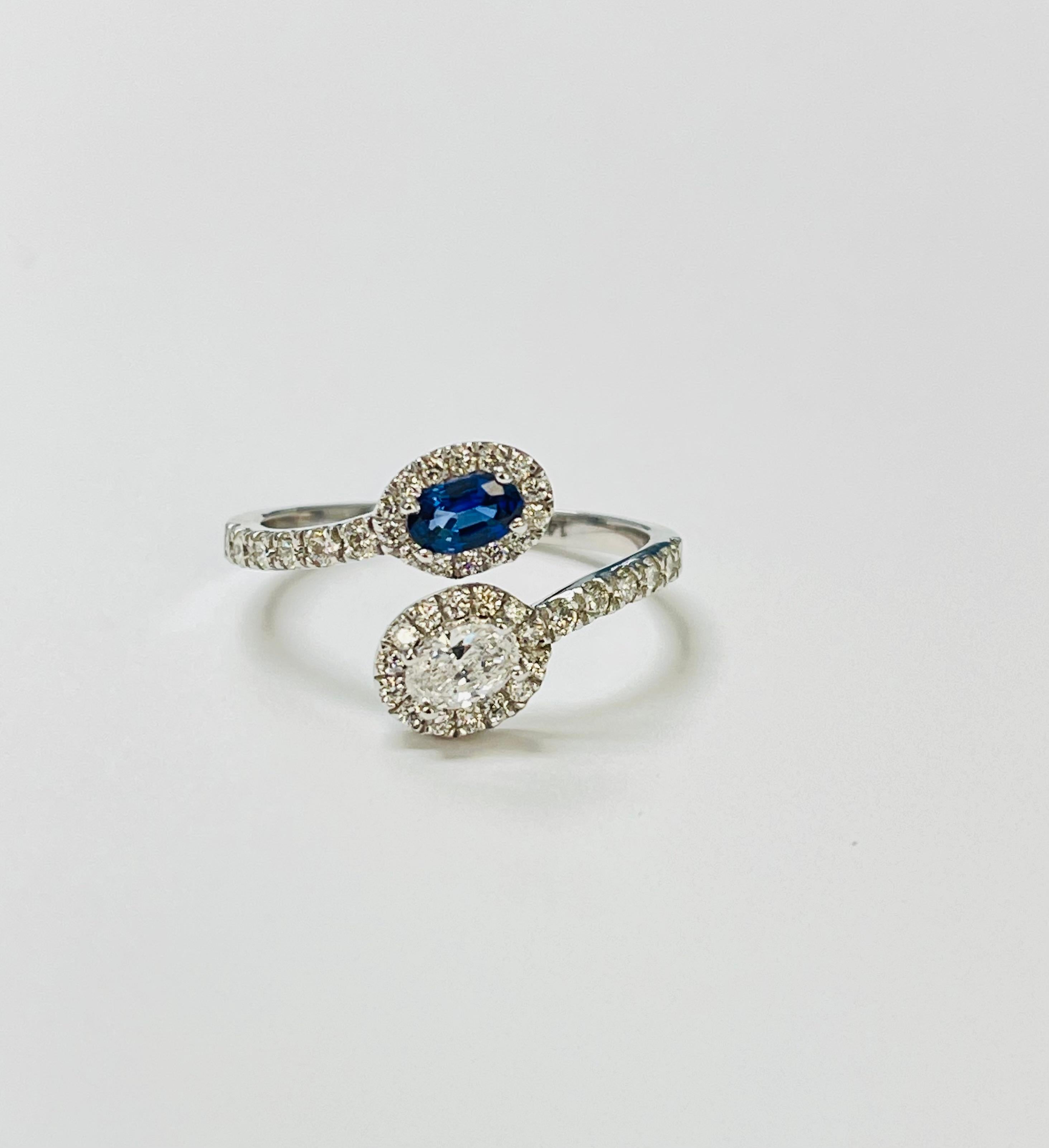 Blue Sapphire and Diamond By Pass Engagement Ring In 14 karat White Gold. en Nuevo estado para la venta en New York, NY