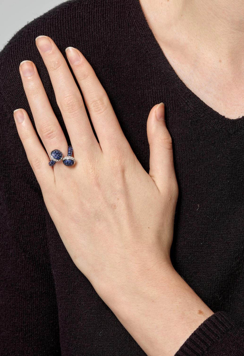 Contemporary Blue Sapphire and Diamond by Pass Ring in 18k White Gold For Sale