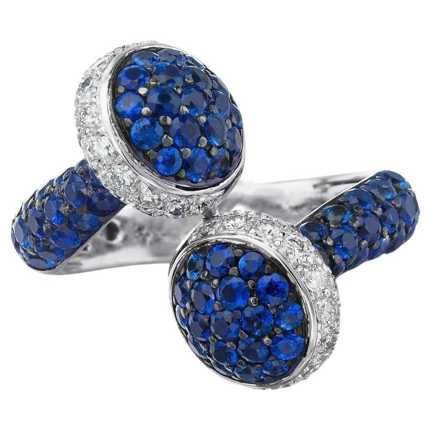 Blue Sapphire and Diamond by Pass Ring in 18k White Gold For Sale