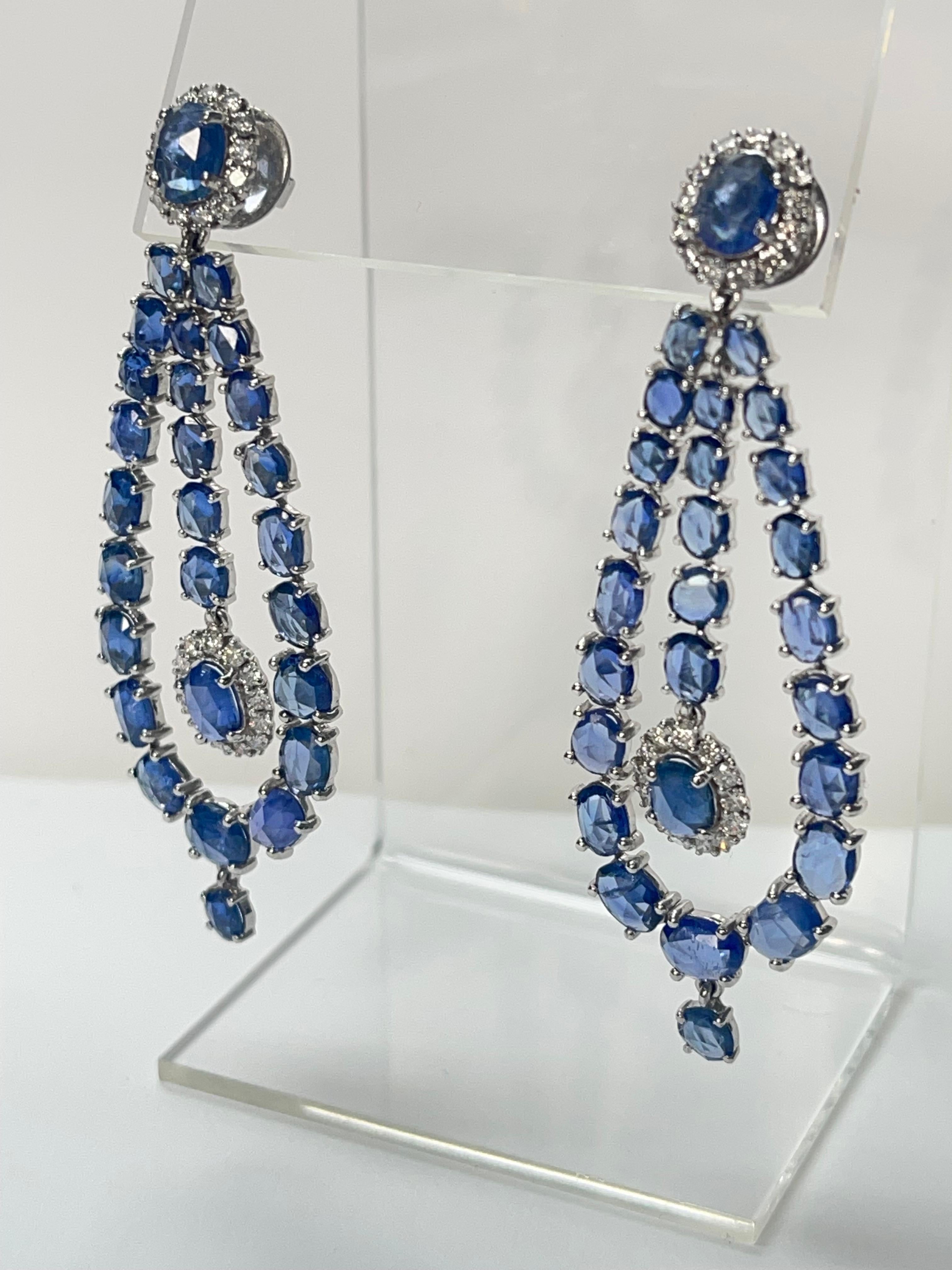 Oval Cut  Blue Sapphire And Diamond Chandelier Earrings In 18K White Gold.  For Sale
