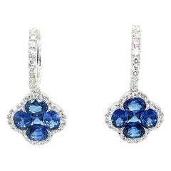 Blue Sapphire and Diamond Clover Dangle Earrings in 18k White Gold