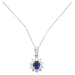 Blue Sapphire and Diamond Cluster Pendant Necklace in Platinum