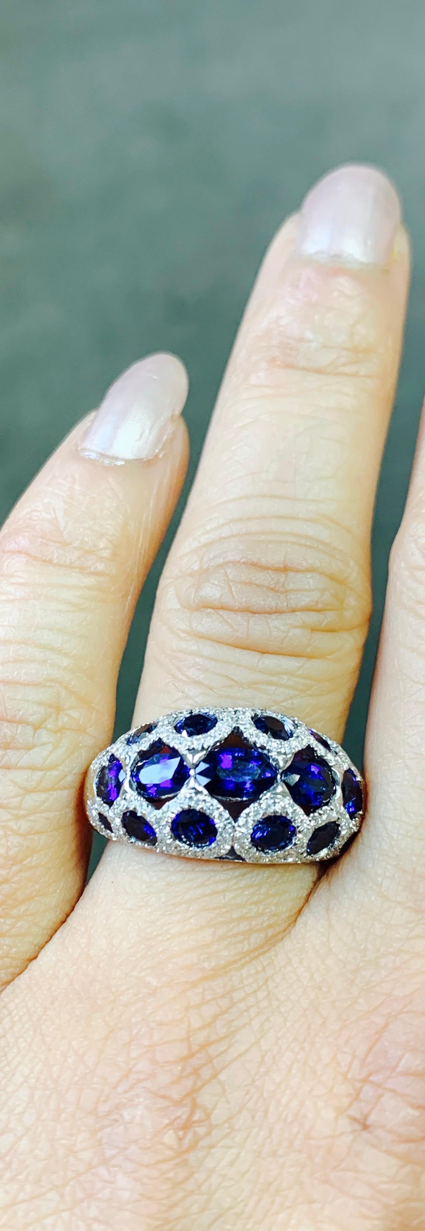 Oval Cut Blue Sapphire and Diamond Cocktail Ring in 18 Karat White Gold. For Sale