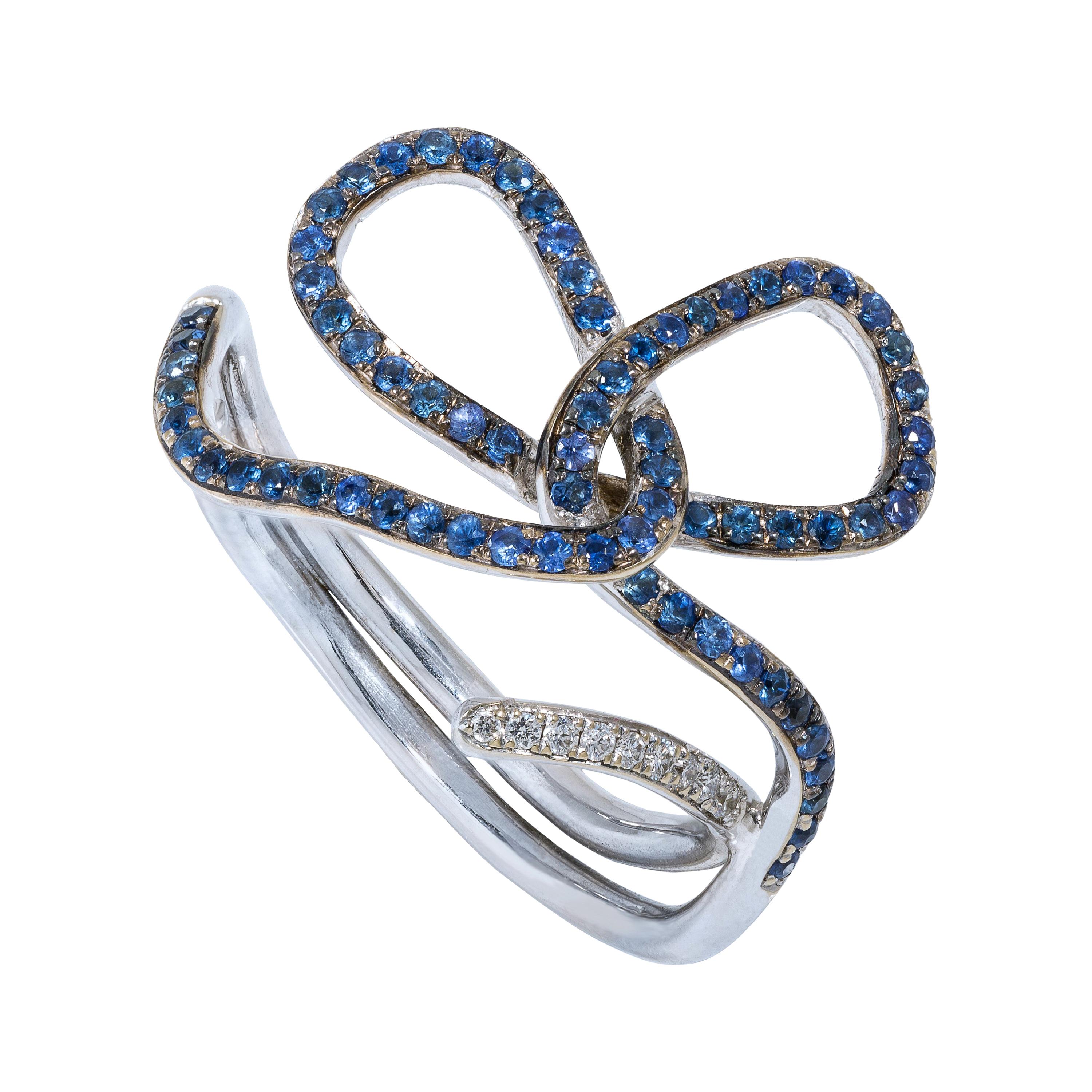 Rosior one-off Blue Sapphire and Diamond "Ribbon" Ring set in White Gold For Sale