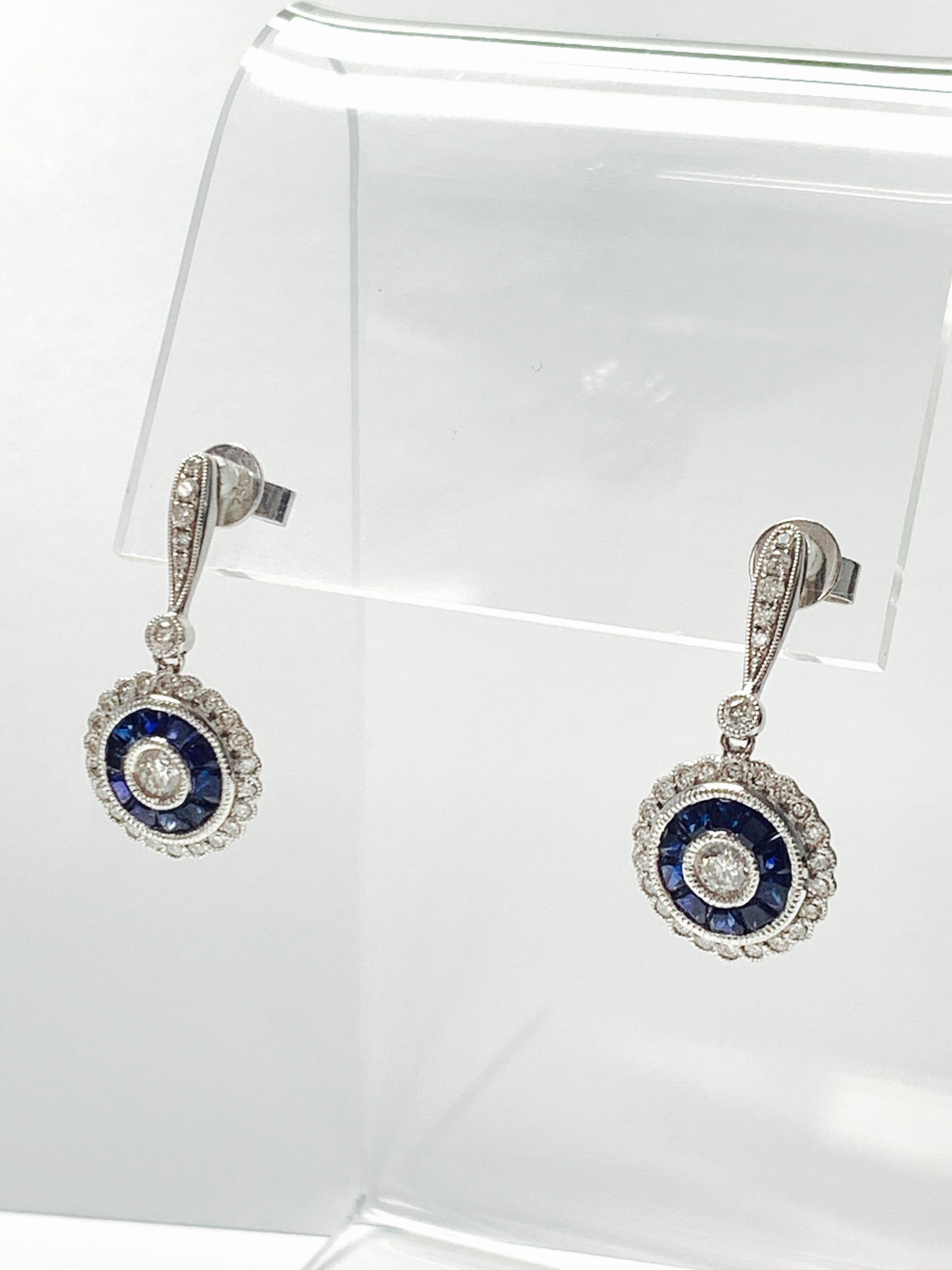 Round Cut Blue Sapphire and Diamond Dangle Earrings in Platinum and 18k White Gold For Sale