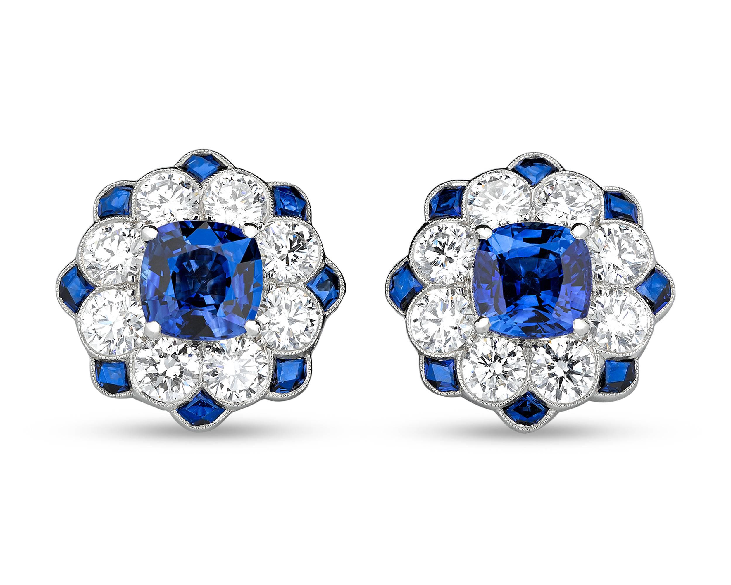 The velvety blue of fine sapphires makes an elegant impression in these sumptuous earrings. The sapphires, weighing 2.54 total carats, mingle amongst 2.82 carats of white diamonds to create these breathtaking jewelry creations. Set in platinum. 