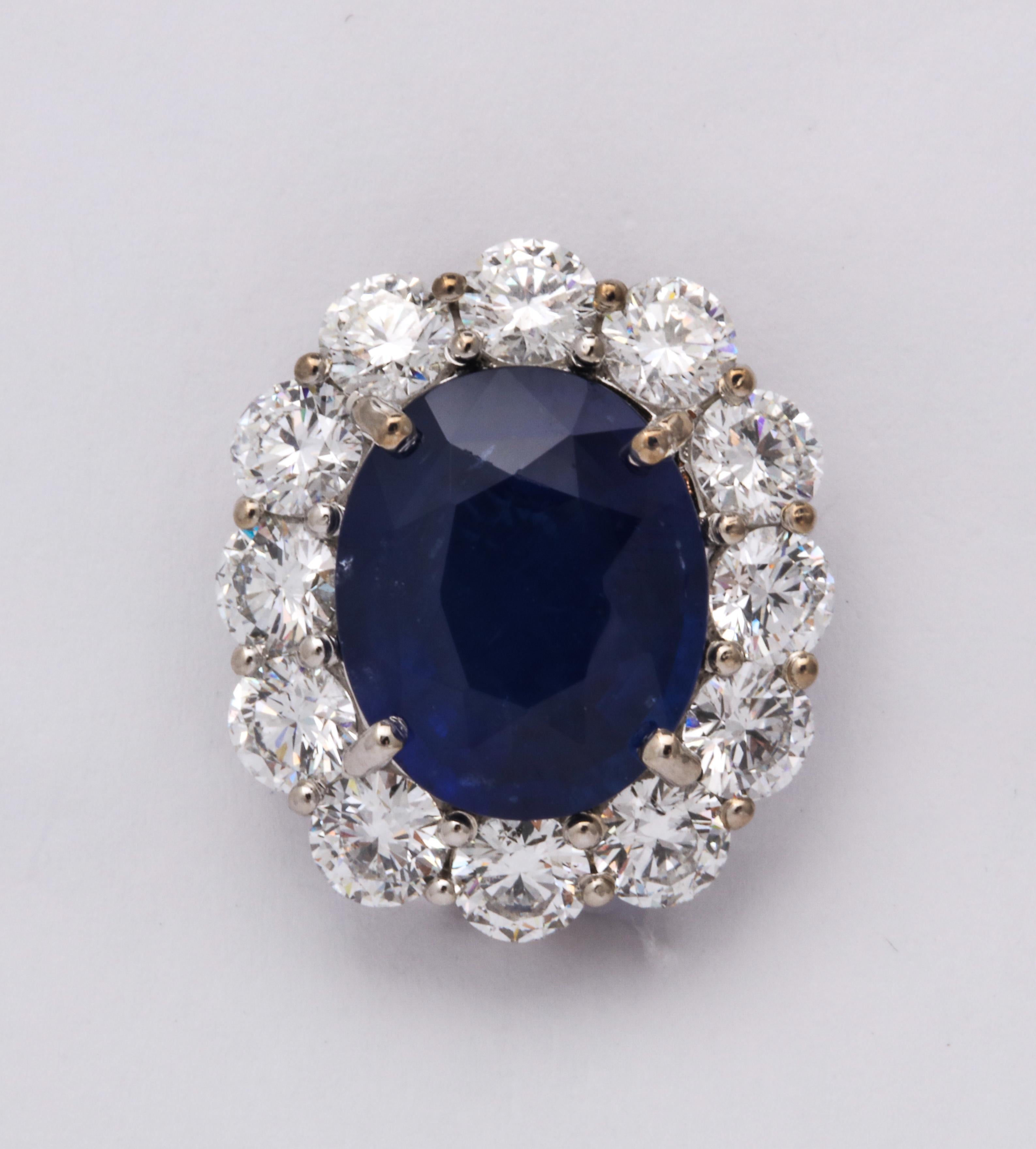 
A fabulous and timeless sapphire and diamond earring!

13.49 carats of beautiful Ceylon sapphires set in a custom made 5.62 carat diamond mounting. 

Certified CEYLON sapphires by Christian Dunaigre of Switzerland.

18k white gold.

.77 inches